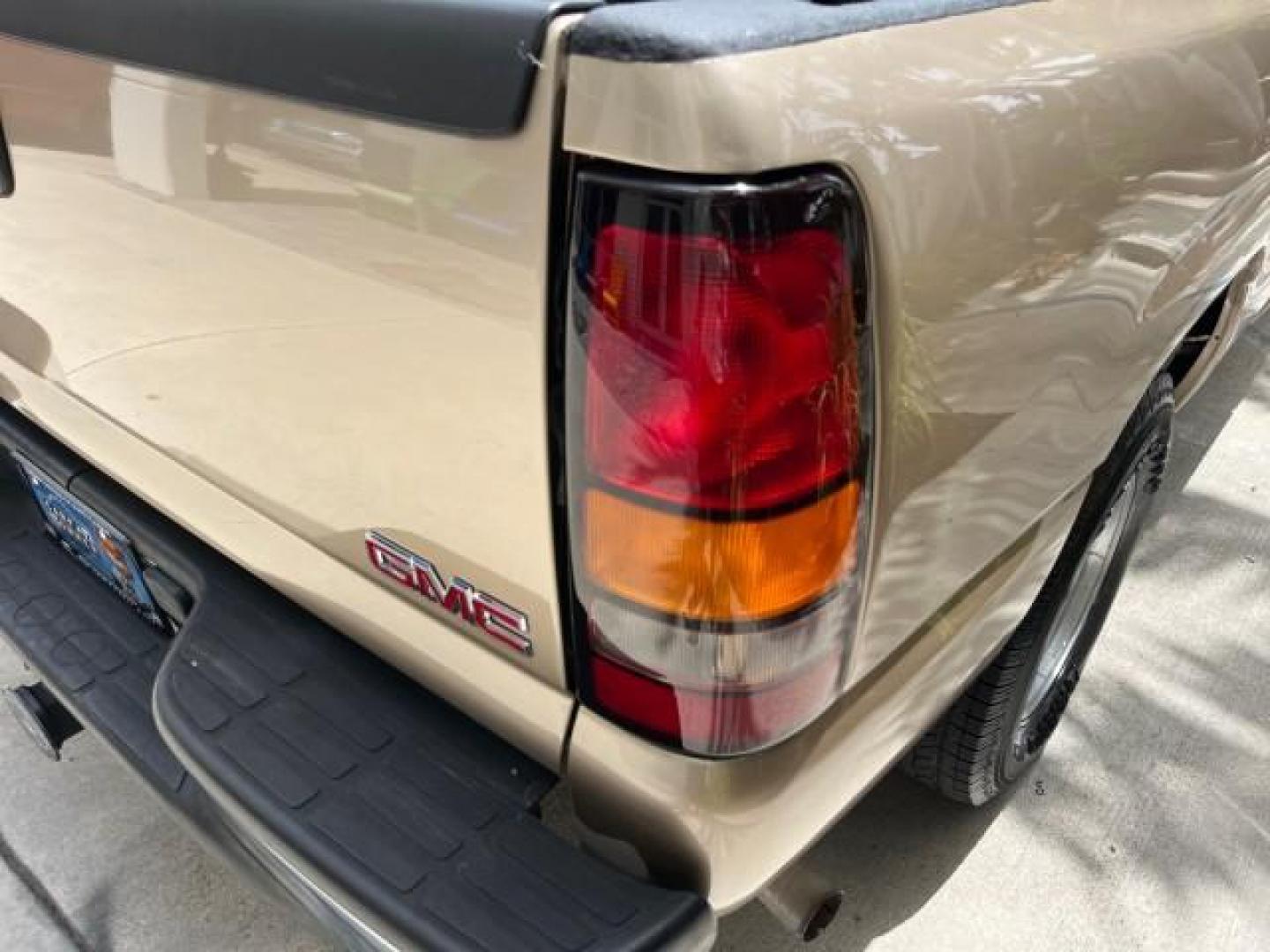 2004 Sand Beige Metallic /Pewter GMC Sierra 1500 SLT 1 OWNER LOW MILES (2GTEC19T141) with an 5.3L Vortec 5300 V8 SFI Engine engine, Automatic transmission, located at 4701 North Dixie Hwy, Pompano Beach, FL, 33064, (954) 422-2889, 26.240938, -80.123474 - OUR WEBPAGE FLORIDACARS1.COM HAS OVER 100 PHOTOS AND FREE CARFAX LINK 2004 GMC SIERRA 1500 SLE ROAD READY 5.3L V8 VIN: 2GTEC19T141143145 NO ACCIDENTS 4 DOOR EXTENDED CAB PICKUP NO RECALLS 5.3L V8 F POWER LEATHER SEATS GASOLINE 1 OWNER 6,7 FT BED REAR WHEEL DRIVE 17 SERVICE RECORDS LOW MILES 72,982 A - Photo#89