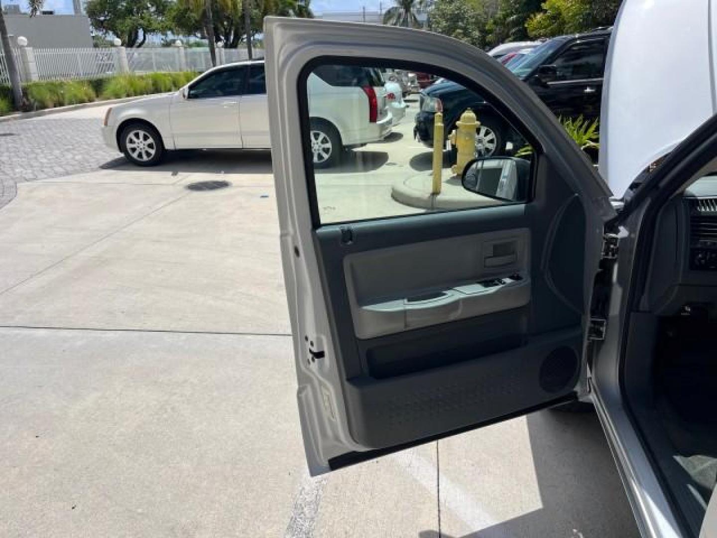 2005 Bright Silver Metallic /Med Slate Gray Dodge Dakota X CAB SLT LOW MILES 65,989 (1D7HE42KX5S) with an 3.7L V6 Magnum Engine engine, Automatic transmission, located at 4701 North Dixie Hwy, Pompano Beach, FL, 33064, (954) 422-2889, 26.240938, -80.123474 - OUR WEBPAGE FLORIDACARS1.COM HAS OVER 90 PHOTOS AND FREE CARFAX LINK 2005 DODGE DAKOTA SLT ROAD READY WORK READY VIN: 1D7HE42KX5S129990 FLORIDA OWNER 3.7L V6 CLUB CAB PICKUP LOW MILES 65,989 3.7L V6 F 6.6FT BED LENGHT GASOLINE POWER SEATS REAR WHEEL DRIVE POWER MIRRORS 6.6' Bed Length Alloy Wheels A - Photo#9