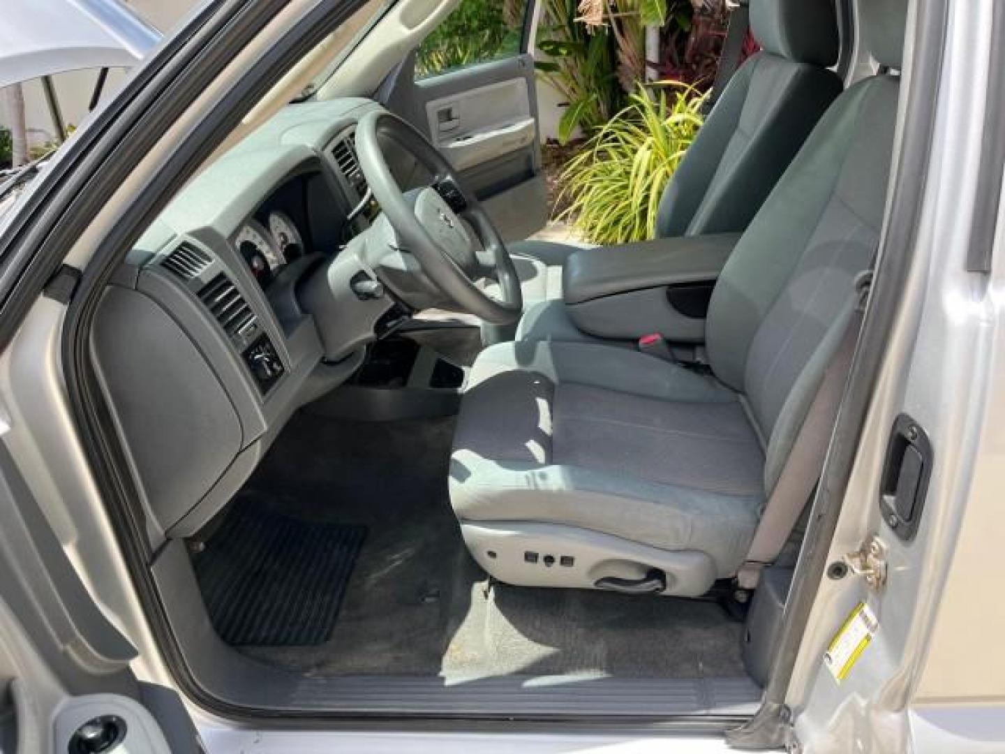 2005 Bright Silver Metallic /Med Slate Gray Dodge Dakota X CAB SLT LOW MILES 65,989 (1D7HE42KX5S) with an 3.7L V6 Magnum Engine engine, Automatic transmission, located at 4701 North Dixie Hwy, Pompano Beach, FL, 33064, (954) 422-2889, 26.240938, -80.123474 - OUR WEBPAGE FLORIDACARS1.COM HAS OVER 90 PHOTOS AND FREE CARFAX LINK 2005 DODGE DAKOTA SLT ROAD READY WORK READY VIN: 1D7HE42KX5S129990 FLORIDA OWNER 3.7L V6 CLUB CAB PICKUP LOW MILES 65,989 3.7L V6 F 6.6FT BED LENGHT GASOLINE POWER SEATS REAR WHEEL DRIVE POWER MIRRORS 6.6' Bed Length Alloy Wheels A - Photo#10