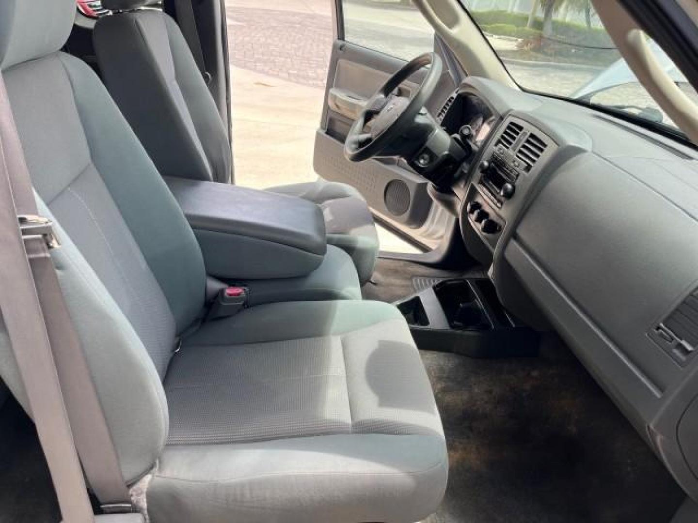 2005 Bright Silver Metallic /Med Slate Gray Dodge Dakota X CAB SLT LOW MILES 65,989 (1D7HE42KX5S) with an 3.7L V6 Magnum Engine engine, Automatic transmission, located at 4701 North Dixie Hwy, Pompano Beach, FL, 33064, (954) 422-2889, 26.240938, -80.123474 - OUR WEBPAGE FLORIDACARS1.COM HAS OVER 90 PHOTOS AND FREE CARFAX LINK 2005 DODGE DAKOTA SLT ROAD READY WORK READY VIN: 1D7HE42KX5S129990 FLORIDA OWNER 3.7L V6 CLUB CAB PICKUP LOW MILES 65,989 3.7L V6 F 6.6FT BED LENGHT GASOLINE POWER SEATS REAR WHEEL DRIVE POWER MIRRORS 6.6' Bed Length Alloy Wheels A - Photo#25