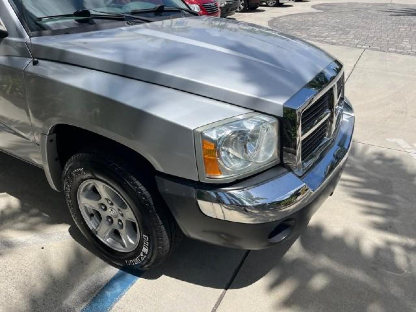 2005 Bright Silver Metallic /Med Slate Gray Dodge Dakota X CAB SLT LOW MILES 65,989 (1D7HE42KX5S) with an 3.7L V6 Magnum Engine engine, Automatic transmission, located at 4701 North Dixie Hwy, Pompano Beach, FL, 33064, (954) 422-2889, 26.240938, -80.123474 - OUR WEBPAGE FLORIDACARS1.COM HAS OVER 90 PHOTOS AND FREE CARFAX LINK 2005 DODGE DAKOTA SLT ROAD READY WORK READY VIN: 1D7HE42KX5S129990 FLORIDA OWNER 3.7L V6 CLUB CAB PICKUP LOW MILES 65,989 3.7L V6 F 6.6FT BED LENGHT GASOLINE POWER SEATS REAR WHEEL DRIVE POWER MIRRORS 6.6' Bed Length Alloy Wheels A - Photo#68