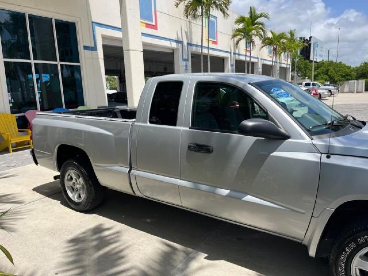 2005 Bright Silver Metallic /Med Slate Gray Dodge Dakota X CAB SLT LOW MILES 65,989 (1D7HE42KX5S) with an 3.7L V6 Magnum Engine engine, Automatic transmission, located at 4701 North Dixie Hwy, Pompano Beach, FL, 33064, (954) 422-2889, 26.240938, -80.123474 - OUR WEBPAGE FLORIDACARS1.COM HAS OVER 90 PHOTOS AND FREE CARFAX LINK 2005 DODGE DAKOTA SLT ROAD READY WORK READY VIN: 1D7HE42KX5S129990 FLORIDA OWNER 3.7L V6 CLUB CAB PICKUP LOW MILES 65,989 3.7L V6 F 6.6FT BED LENGHT GASOLINE POWER SEATS REAR WHEEL DRIVE POWER MIRRORS 6.6' Bed Length Alloy Wheels A - Photo#71