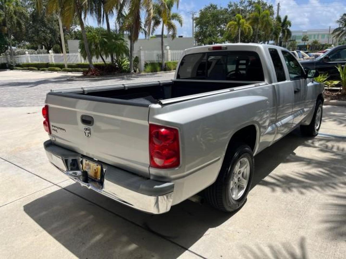 2005 Bright Silver Metallic /Med Slate Gray Dodge Dakota X CAB SLT LOW MILES 65,989 (1D7HE42KX5S) with an 3.7L V6 Magnum Engine engine, Automatic transmission, located at 4701 North Dixie Hwy, Pompano Beach, FL, 33064, (954) 422-2889, 26.240938, -80.123474 - OUR WEBPAGE FLORIDACARS1.COM HAS OVER 90 PHOTOS AND FREE CARFAX LINK 2005 DODGE DAKOTA SLT ROAD READY WORK READY VIN: 1D7HE42KX5S129990 FLORIDA OWNER 3.7L V6 CLUB CAB PICKUP LOW MILES 65,989 3.7L V6 F 6.6FT BED LENGHT GASOLINE POWER SEATS REAR WHEEL DRIVE POWER MIRRORS 6.6' Bed Length Alloy Wheels A - Photo#78