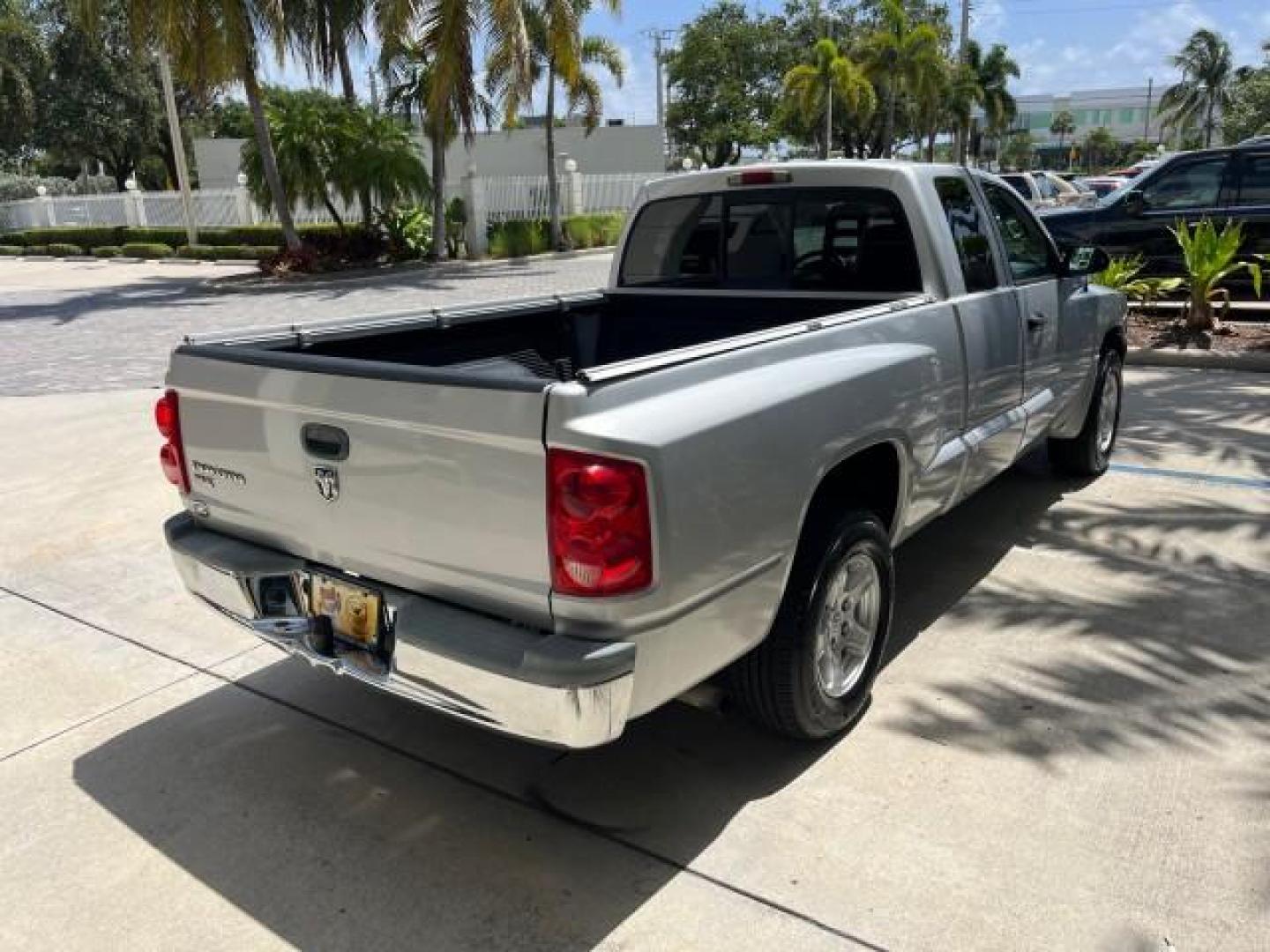 2005 Bright Silver Metallic /Med Slate Gray Dodge Dakota X CAB SLT LOW MILES 65,989 (1D7HE42KX5S) with an 3.7L V6 Magnum Engine engine, Automatic transmission, located at 4701 North Dixie Hwy, Pompano Beach, FL, 33064, (954) 422-2889, 26.240938, -80.123474 - OUR WEBPAGE FLORIDACARS1.COM HAS OVER 90 PHOTOS AND FREE CARFAX LINK 2005 DODGE DAKOTA SLT ROAD READY WORK READY VIN: 1D7HE42KX5S129990 FLORIDA OWNER 3.7L V6 CLUB CAB PICKUP LOW MILES 65,989 3.7L V6 F 6.6FT BED LENGHT GASOLINE POWER SEATS REAR WHEEL DRIVE POWER MIRRORS 6.6' Bed Length Alloy Wheels A - Photo#7