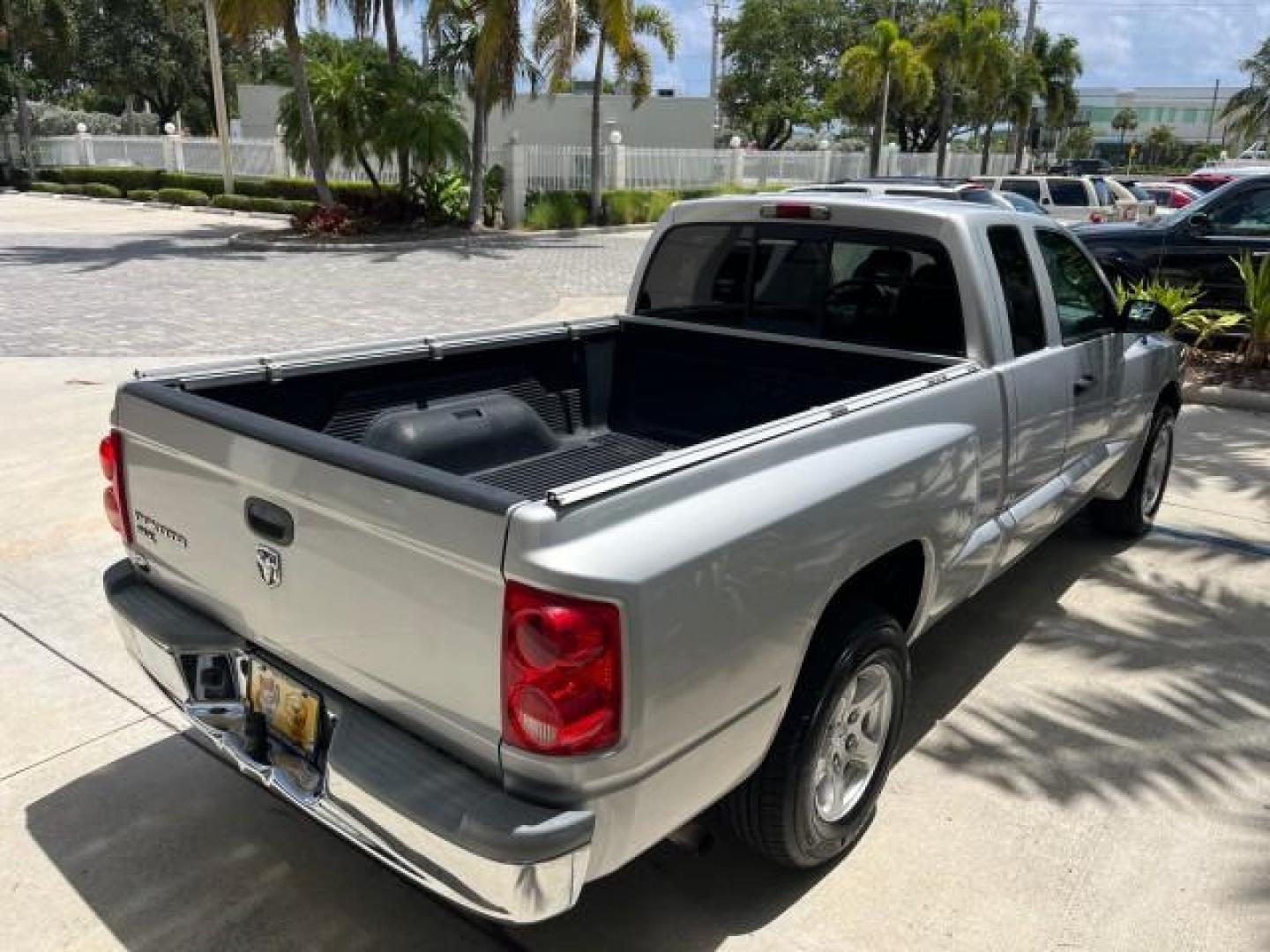 2005 Bright Silver Metallic /Med Slate Gray Dodge Dakota X CAB SLT LOW MILES 65,989 (1D7HE42KX5S) with an 3.7L V6 Magnum Engine engine, Automatic transmission, located at 4701 North Dixie Hwy, Pompano Beach, FL, 33064, (954) 422-2889, 26.240938, -80.123474 - OUR WEBPAGE FLORIDACARS1.COM HAS OVER 90 PHOTOS AND FREE CARFAX LINK 2005 DODGE DAKOTA SLT ROAD READY WORK READY VIN: 1D7HE42KX5S129990 FLORIDA OWNER 3.7L V6 CLUB CAB PICKUP LOW MILES 65,989 3.7L V6 F 6.6FT BED LENGHT GASOLINE POWER SEATS REAR WHEEL DRIVE POWER MIRRORS 6.6' Bed Length Alloy Wheels A - Photo#83