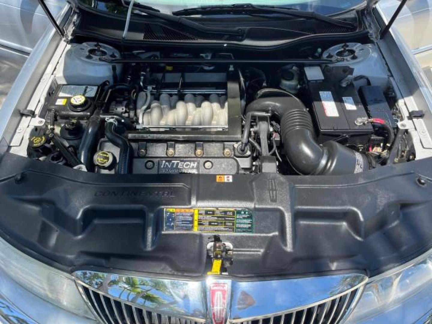 2002 Charcoal Grey Metallic /Light Graphite Lincoln Continental w/Luxury Appearance (1LNHM97VX2Y) with an 4.6L DOHC 32-Valve V8 Intech Engine engine, Automatic transmission, located at 4701 North Dixie Hwy, Pompano Beach, FL, 33064, (954) 422-2889, 26.240938, -80.123474 - OUR WEBPAGE FLORIDACARS1.COM HAS OVER 100 PHOTOS AND FREE CARFAX LINK 2002 LINCOLN CONTINENTAL ROAD READY 4.6L 8 VIN: 1LNHM97VX2Y606824 NO ACCIDENTS 25 MPG SEDAN 4 DR NO RECALLS 4.6L V8 F DOHC 32V POWER LEATHER SEATS GASOLINE POWER SUNROOF FRONT WHEEL DRIVE LOW MILES 58,082 18 SERVICE RECORDS Air Su - Photo#17