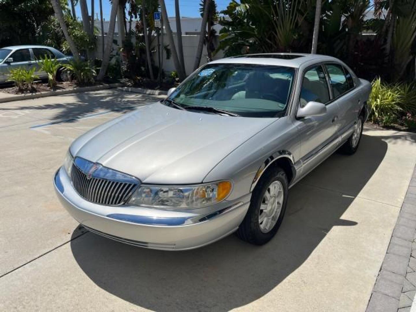 2002 Charcoal Grey Metallic /Light Graphite Lincoln Continental w/Luxury Appearance (1LNHM97VX2Y) with an 4.6L DOHC 32-Valve V8 Intech Engine engine, Automatic transmission, located at 4701 North Dixie Hwy, Pompano Beach, FL, 33064, (954) 422-2889, 26.240938, -80.123474 - OUR WEBPAGE FLORIDACARS1.COM HAS OVER 100 PHOTOS AND FREE CARFAX LINK 2002 LINCOLN CONTINENTAL ROAD READY 4.6L 8 VIN: 1LNHM97VX2Y606824 NO ACCIDENTS 25 MPG SEDAN 4 DR NO RECALLS 4.6L V8 F DOHC 32V POWER LEATHER SEATS GASOLINE POWER SUNROOF FRONT WHEEL DRIVE LOW MILES 58,082 18 SERVICE RECORDS Air Su - Photo#3