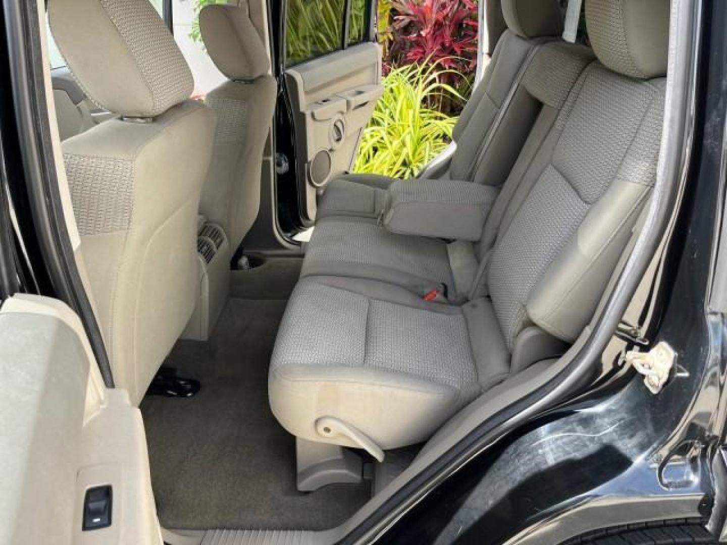 2006 Black /Khaki Jeep Commander 4WD LOW MILES 80,432 (1J8HG48K76C) with an 3.7L V6 Engine engine, Automatic transmission, located at 4701 North Dixie Hwy, Pompano Beach, FL, 33064, (954) 422-2889, 26.240938, -80.123474 - OUR WEBPAGE FLORIDACARS1.COM HAS OVER 100 PHOTOS AND FREE CARFAX LINK 2006 JEEP COMMANDER ROAD READY 3.7L V6 4X4 VIN: 1J8HG48K76C206508 NO ACCIDENTS NO RECALLS 4 DOOR WAGON/SPORT UTILITY 47 SERVICE RECORDS 3.7L V6 F LOW MILES 80,432 GASOLINE POWER SEATS/MIRRORS REAR WHEEL DRIVE W/ 4X4 4X4 BACK UP SE - Photo#14