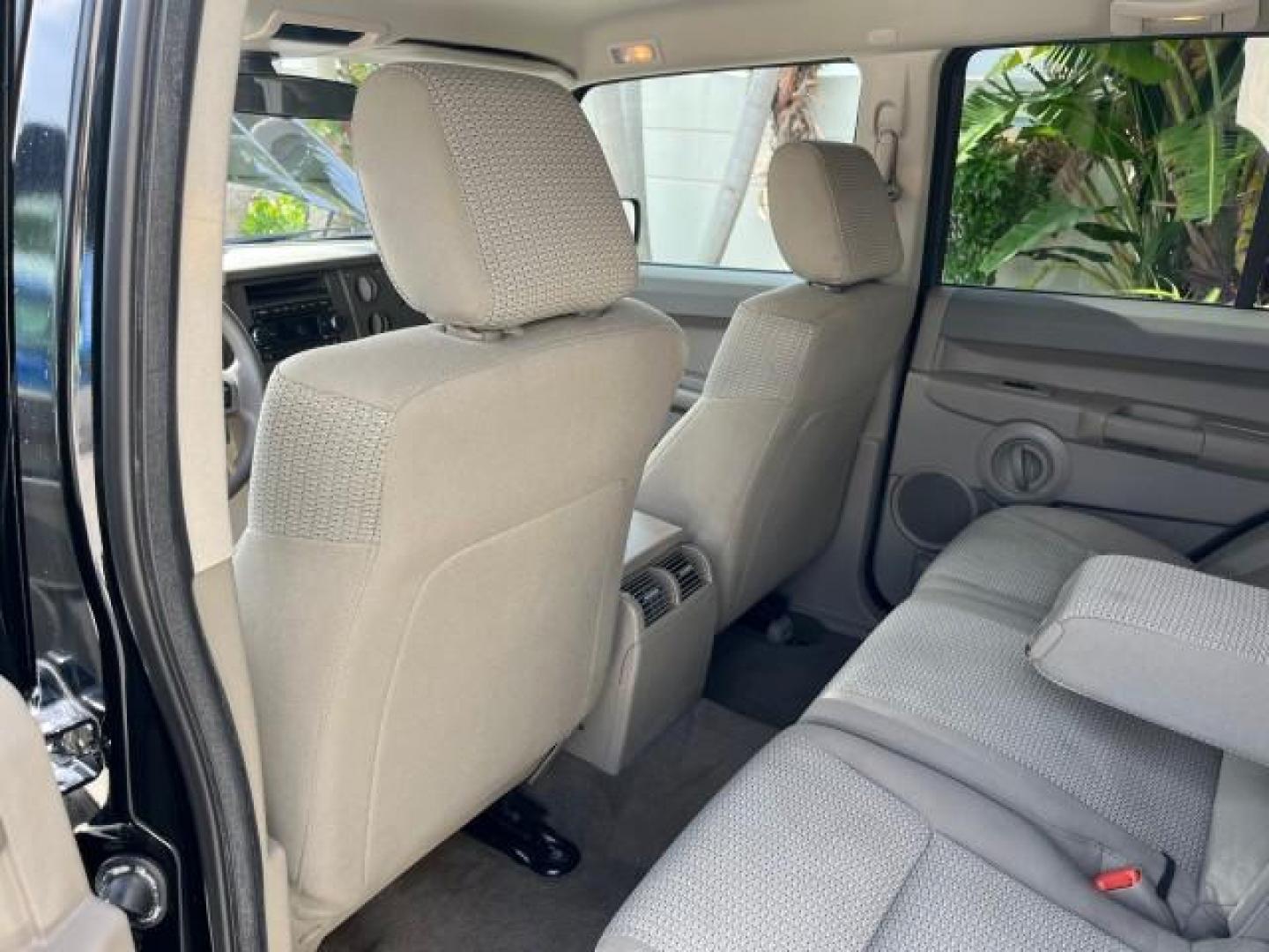 2006 Black /Khaki Jeep Commander 4WD LOW MILES 80,432 (1J8HG48K76C) with an 3.7L V6 Engine engine, Automatic transmission, located at 4701 North Dixie Hwy, Pompano Beach, FL, 33064, (954) 422-2889, 26.240938, -80.123474 - OUR WEBPAGE FLORIDACARS1.COM HAS OVER 100 PHOTOS AND FREE CARFAX LINK 2006 JEEP COMMANDER ROAD READY 3.7L V6 4X4 VIN: 1J8HG48K76C206508 NO ACCIDENTS NO RECALLS 4 DOOR WAGON/SPORT UTILITY 47 SERVICE RECORDS 3.7L V6 F LOW MILES 80,432 GASOLINE POWER SEATS/MIRRORS REAR WHEEL DRIVE W/ 4X4 4X4 BACK UP SE - Photo#38