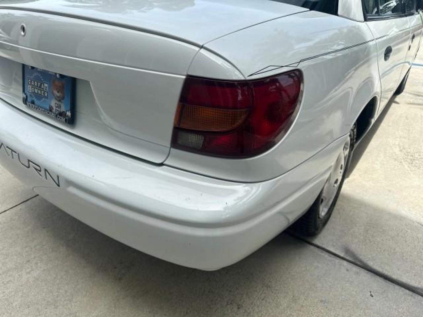 2000 White /Grey Saturn SL 1 FL LOW MILES 13,112 (1G8ZH528XYZ) with an 1.9L SOHC SPFI L4 Aluminum Engine engine, Automatic transmission, located at 4701 North Dixie Hwy, Pompano Beach, FL, 33064, (954) 422-2889, 26.240938, -80.123474 - OUR WEBPAGE FLORIDACARS1.COM HAS OVER 100 PHOTOS AND FREE CARFAX LINK 2000 SATURN S-SERIES SL1 ROAD READY VIN: 1G8ZH528XYZ155740 NO ACCIDENTS SEDAN 4 DR NO RECALLS 1.9L I4 F SOHC 1 OWNER FLORIDA GASOLINE 1.9L L4 38 MPG FRONT WHEEL DRIVE SUPER LOW MILES 13,112 FWD Front Bucket Seats THIS IS ONE OF TH - Photo#30