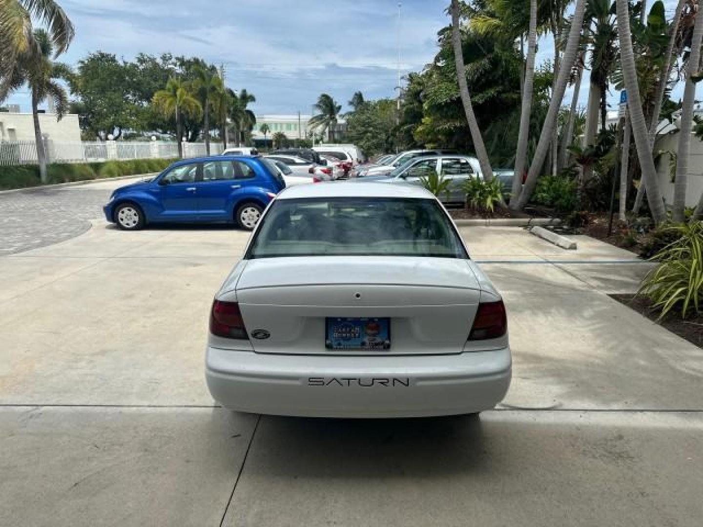 2000 White /Grey Saturn SL 1 FL LOW MILES 13,112 (1G8ZH528XYZ) with an 1.9L SOHC SPFI L4 Aluminum Engine engine, Automatic transmission, located at 4701 North Dixie Hwy, Pompano Beach, FL, 33064, (954) 422-2889, 26.240938, -80.123474 - OUR WEBPAGE FLORIDACARS1.COM HAS OVER 100 PHOTOS AND FREE CARFAX LINK 2000 SATURN S-SERIES SL1 ROAD READY VIN: 1G8ZH528XYZ155740 NO ACCIDENTS SEDAN 4 DR NO RECALLS 1.9L I4 F SOHC 1 OWNER FLORIDA GASOLINE 1.9L L4 38 MPG FRONT WHEEL DRIVE SUPER LOW MILES 13,112 FWD Front Bucket Seats THIS IS ONE OF TH - Photo#6