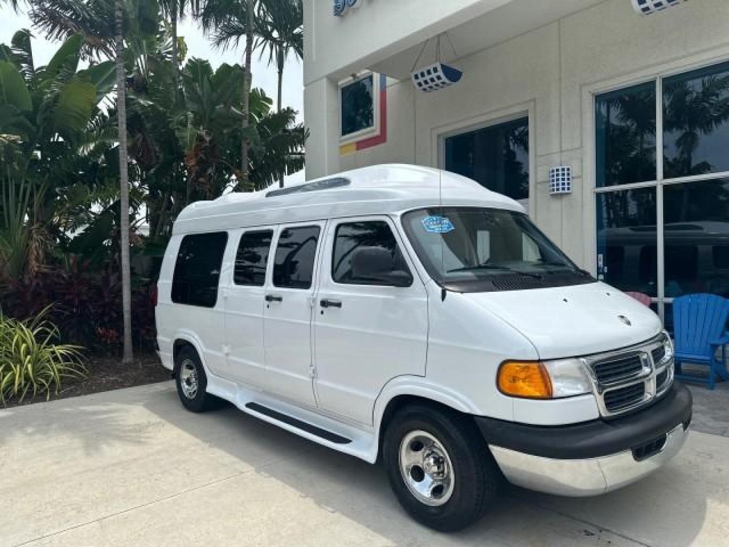 2000 Bright White /Mist Gray Dodge Ram Van HI TOP Conversion (2B6HB11YXYK) with an 5.2L MPI V8 Magnum Engine engine, Automatic transmission, located at 4701 North Dixie Hwy, Pompano Beach, FL, 33064, (954) 422-2889, 26.240938, -80.123474 - OUR WEBPAGE FLORIDACARS1.COM HAS OVER 100 PHOTOS AND FREE CARFAX LINK 2000 DODGE RAM VAN B1500 1 OWNER CALIFORNIA TITLE OWNED SALT FREE HARD TO FIND IN THIS CONDITION CALIFORNIA STAR CUSTOM VAN VIN: 2B6HB11YXYK110186 VAN 5.2L V8 F OHV 16V GASOLINE REAR WHEEL DRIVE Leather Seats Rear Air Conditioning - Photo#1