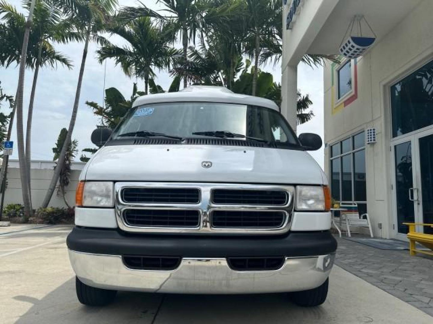 2000 Bright White /Mist Gray Dodge Ram Van HI TOP Conversion (2B6HB11YXYK) with an 5.2L MPI V8 Magnum Engine engine, Automatic transmission, located at 4701 North Dixie Hwy, Pompano Beach, FL, 33064, (954) 422-2889, 26.240938, -80.123474 - OUR WEBPAGE FLORIDACARS1.COM HAS OVER 100 PHOTOS AND FREE CARFAX LINK 2000 DODGE RAM VAN B1500 1 OWNER CALIFORNIA TITLE OWNED SALT FREE HARD TO FIND IN THIS CONDITION CALIFORNIA STAR CUSTOM VAN VIN: 2B6HB11YXYK110186 VAN 5.2L V8 F OHV 16V GASOLINE REAR WHEEL DRIVE Leather Seats Rear Air Conditioning - Photo#28