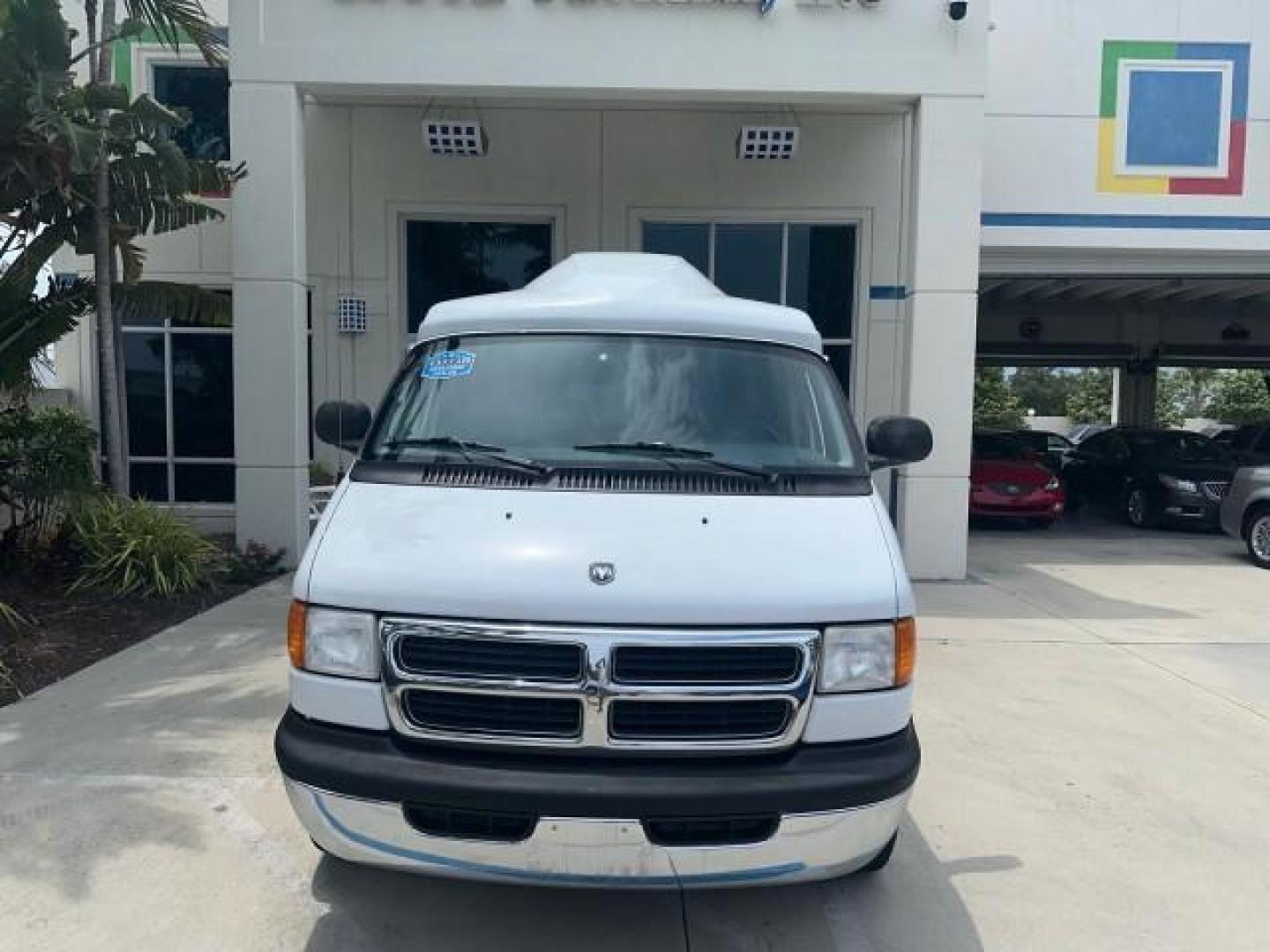 2000 Bright White /Mist Gray Dodge Ram Van HI TOP Conversion (2B6HB11YXYK) with an 5.2L MPI V8 Magnum Engine engine, Automatic transmission, located at 4701 North Dixie Hwy, Pompano Beach, FL, 33064, (954) 422-2889, 26.240938, -80.123474 - OUR WEBPAGE FLORIDACARS1.COM HAS OVER 100 PHOTOS AND FREE CARFAX LINK 2000 DODGE RAM VAN B1500 1 OWNER CALIFORNIA TITLE OWNED SALT FREE HARD TO FIND IN THIS CONDITION CALIFORNIA STAR CUSTOM VAN VIN: 2B6HB11YXYK110186 VAN 5.2L V8 F OHV 16V GASOLINE REAR WHEEL DRIVE Leather Seats Rear Air Conditioning - Photo#2