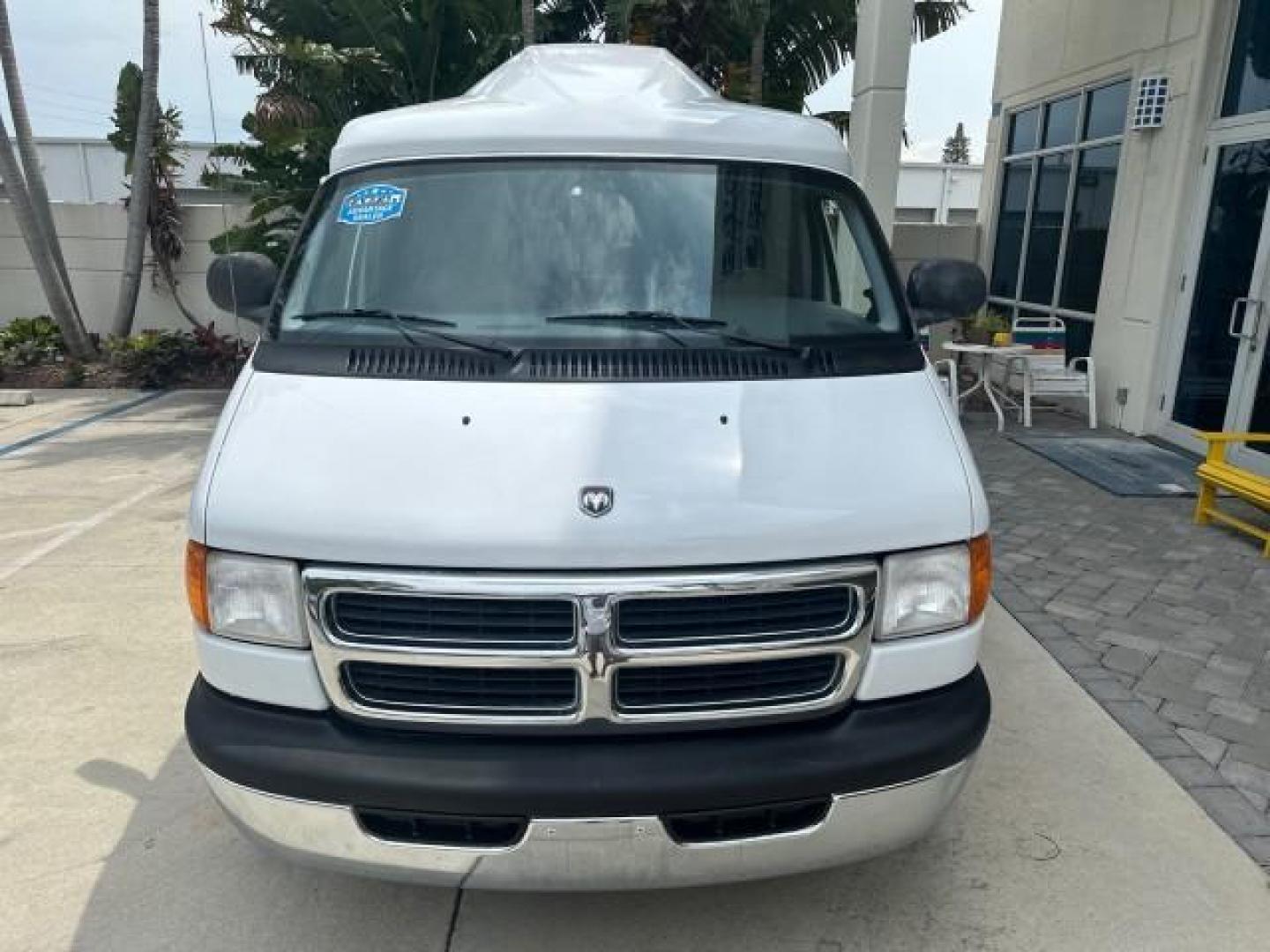 2000 Bright White /Mist Gray Dodge Ram Van HI TOP Conversion (2B6HB11YXYK) with an 5.2L MPI V8 Magnum Engine engine, Automatic transmission, located at 4701 North Dixie Hwy, Pompano Beach, FL, 33064, (954) 422-2889, 26.240938, -80.123474 - OUR WEBPAGE FLORIDACARS1.COM HAS OVER 100 PHOTOS AND FREE CARFAX LINK 2000 DODGE RAM VAN B1500 1 OWNER CALIFORNIA TITLE OWNED SALT FREE HARD TO FIND IN THIS CONDITION CALIFORNIA STAR CUSTOM VAN VIN: 2B6HB11YXYK110186 VAN 5.2L V8 F OHV 16V GASOLINE REAR WHEEL DRIVE Leather Seats Rear Air Conditioning - Photo#29