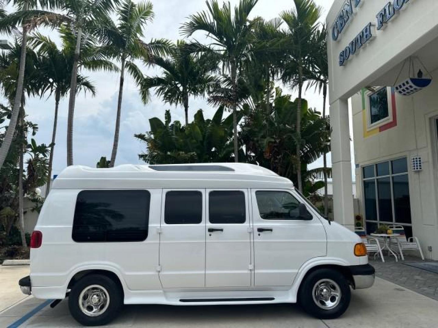 2000 Bright White /Mist Gray Dodge Ram Van HI TOP Conversion (2B6HB11YXYK) with an 5.2L MPI V8 Magnum Engine engine, Automatic transmission, located at 4701 North Dixie Hwy, Pompano Beach, FL, 33064, (954) 422-2889, 26.240938, -80.123474 - OUR WEBPAGE FLORIDACARS1.COM HAS OVER 100 PHOTOS AND FREE CARFAX LINK 2000 DODGE RAM VAN B1500 1 OWNER CALIFORNIA TITLE OWNED SALT FREE HARD TO FIND IN THIS CONDITION CALIFORNIA STAR CUSTOM VAN VIN: 2B6HB11YXYK110186 VAN 5.2L V8 F OHV 16V GASOLINE REAR WHEEL DRIVE Leather Seats Rear Air Conditioning - Photo#55