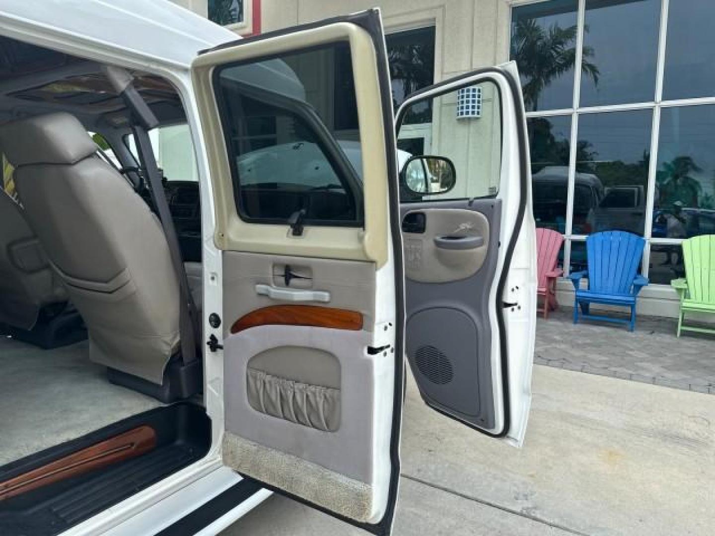 2000 Bright White /Mist Gray Dodge Ram Van HI TOP Conversion (2B6HB11YXYK) with an 5.2L MPI V8 Magnum Engine engine, Automatic transmission, located at 4701 North Dixie Hwy, Pompano Beach, FL, 33064, (954) 422-2889, 26.240938, -80.123474 - OUR WEBPAGE FLORIDACARS1.COM HAS OVER 100 PHOTOS AND FREE CARFAX LINK 2000 DODGE RAM VAN B1500 1 OWNER CALIFORNIA TITLE OWNED SALT FREE HARD TO FIND IN THIS CONDITION CALIFORNIA STAR CUSTOM VAN VIN: 2B6HB11YXYK110186 VAN 5.2L V8 F OHV 16V GASOLINE REAR WHEEL DRIVE Leather Seats Rear Air Conditioning - Photo#59