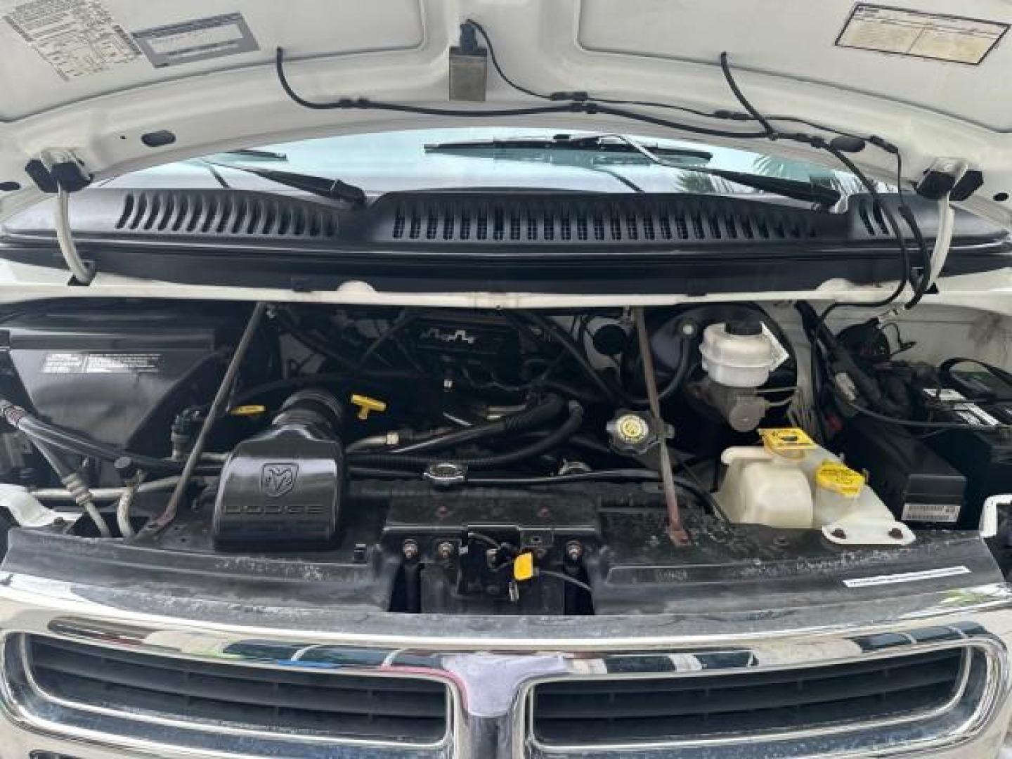 2000 Bright White /Mist Gray Dodge Ram Van HI TOP Conversion (2B6HB11YXYK) with an 5.2L MPI V8 Magnum Engine engine, Automatic transmission, located at 4701 North Dixie Hwy, Pompano Beach, FL, 33064, (954) 422-2889, 26.240938, -80.123474 - OUR WEBPAGE FLORIDACARS1.COM HAS OVER 100 PHOTOS AND FREE CARFAX LINK 2000 DODGE RAM VAN B1500 1 OWNER CALIFORNIA TITLE OWNED SALT FREE HARD TO FIND IN THIS CONDITION CALIFORNIA STAR CUSTOM VAN VIN: 2B6HB11YXYK110186 VAN 5.2L V8 F OHV 16V GASOLINE REAR WHEEL DRIVE Leather Seats Rear Air Conditioning - Photo#84