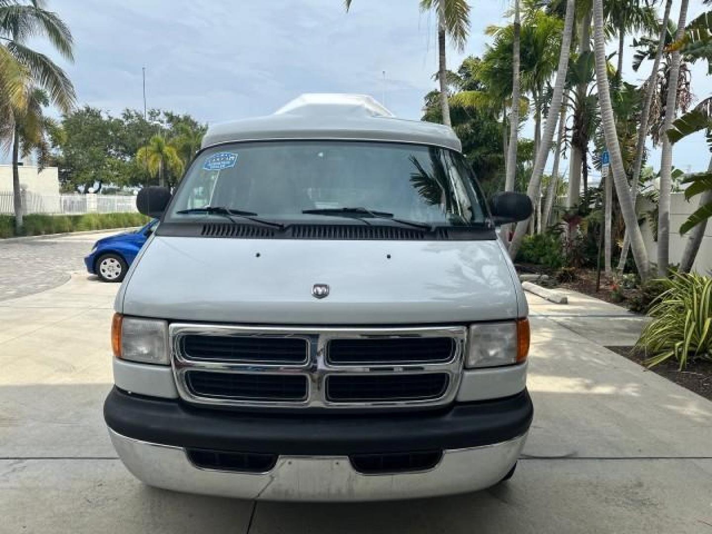 2000 Bright White /Mist Gray Dodge Ram Van HI TOP Conversion (2B6HB11YXYK) with an 5.2L MPI V8 Magnum Engine engine, Automatic transmission, located at 4701 North Dixie Hwy, Pompano Beach, FL, 33064, (954) 422-2889, 26.240938, -80.123474 - OUR WEBPAGE FLORIDACARS1.COM HAS OVER 100 PHOTOS AND FREE CARFAX LINK 2000 DODGE RAM VAN B1500 1 OWNER CALIFORNIA TITLE OWNED SALT FREE HARD TO FIND IN THIS CONDITION CALIFORNIA STAR CUSTOM VAN VIN: 2B6HB11YXYK110186 VAN 5.2L V8 F OHV 16V GASOLINE REAR WHEEL DRIVE Leather Seats Rear Air Conditioning - Photo#93