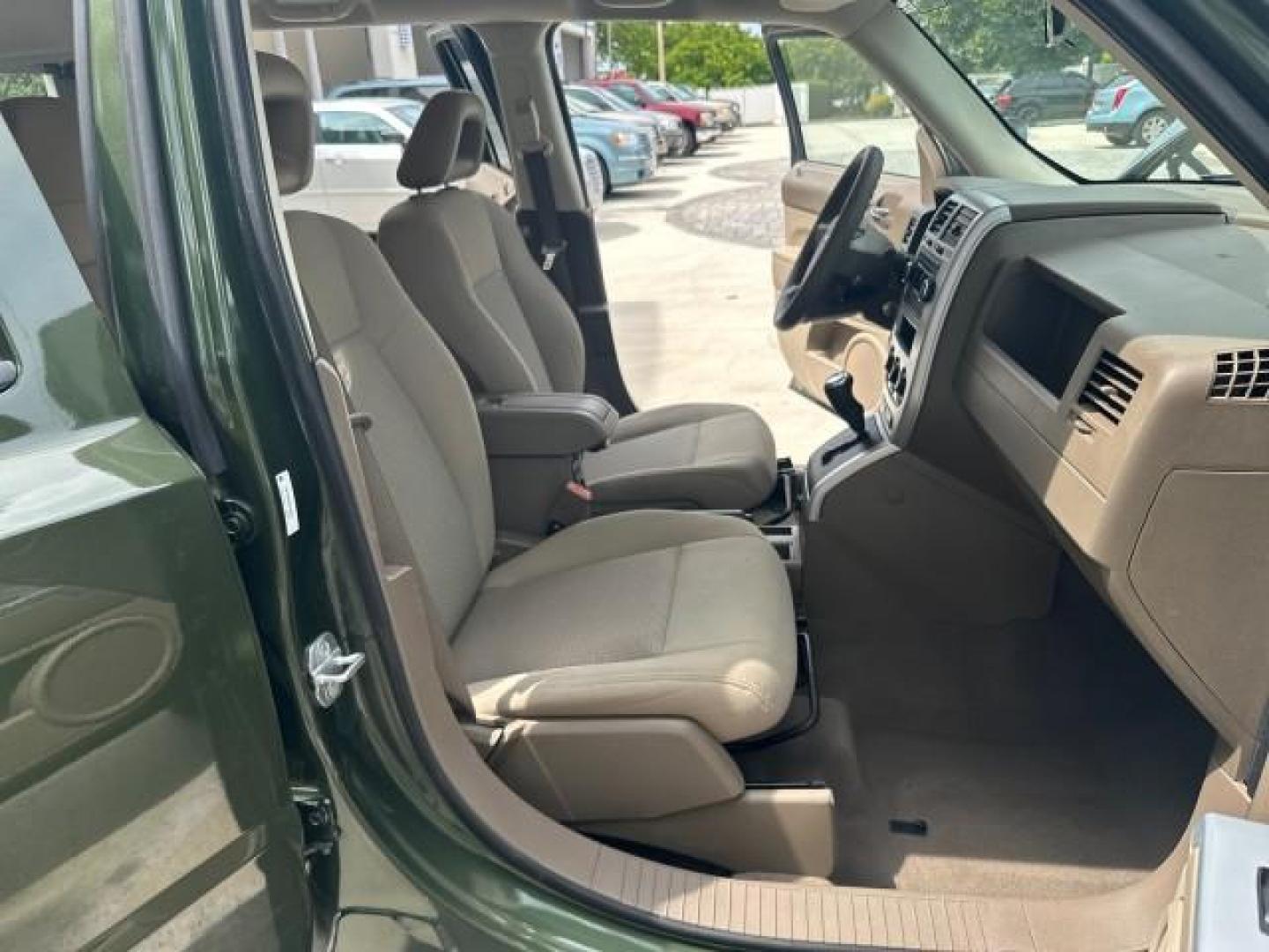 2008 Jeep Green Metallic /Pastel Pebble Beige Jeep Patriot 1 FL Sport LOW MILES 72,642 (1J8FT28W58D) with an 2.4L DOHC 16v I4 Dual VVT Engine engine, Automatic transmission, located at 4701 North Dixie Hwy, Pompano Beach, FL, 33064, (954) 422-2889, 26.240938, -80.123474 - OUR WEBPAGE FLORIDACARS1.COM HAS OVER 100 PHOTOS AND FREE CARFAX LINK 2008 JEEP PATRIOT SPORT ROAD READY 2.4L I4 VIN: 1J8FT28W58D534615 NO RECALLS 4 DOOR WAGON/SPORT UTILITY 1 OWNER FLORIDA 2.4L I4 F DOHC 16V LOW MILES 72,642 GASOLINE 28 SERVICE RECORDS FRONT WHEEL DRIVE NON SMOKERS THIS IS THE ONE - Photo#9