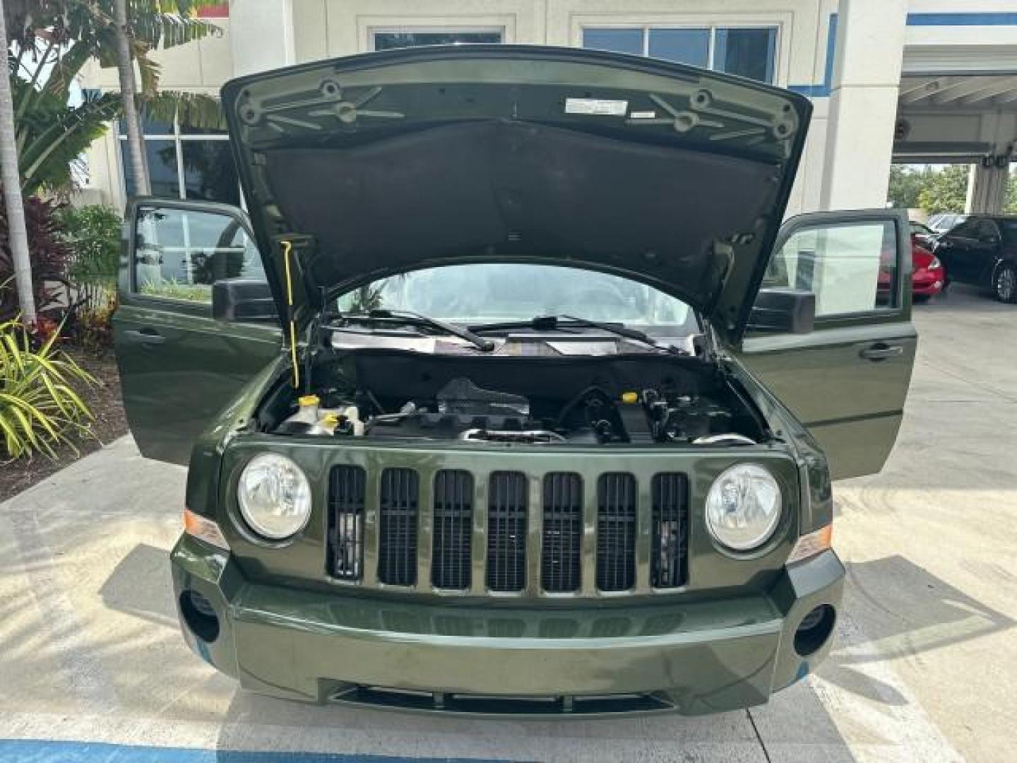 2008 Jeep Green Metallic /Pastel Pebble Beige Jeep Patriot 1 FL Sport LOW MILES 72,642 (1J8FT28W58D) with an 2.4L DOHC 16v I4 Dual VVT Engine engine, Automatic transmission, located at 4701 North Dixie Hwy, Pompano Beach, FL, 33064, (954) 422-2889, 26.240938, -80.123474 - OUR WEBPAGE FLORIDACARS1.COM HAS OVER 100 PHOTOS AND FREE CARFAX LINK 2008 JEEP PATRIOT SPORT ROAD READY 2.4L I4 VIN: 1J8FT28W58D534615 NO RECALLS 4 DOOR WAGON/SPORT UTILITY 1 OWNER FLORIDA 2.4L I4 F DOHC 16V LOW MILES 72,642 GASOLINE 28 SERVICE RECORDS FRONT WHEEL DRIVE NON SMOKERS THIS IS THE ONE - Photo#25