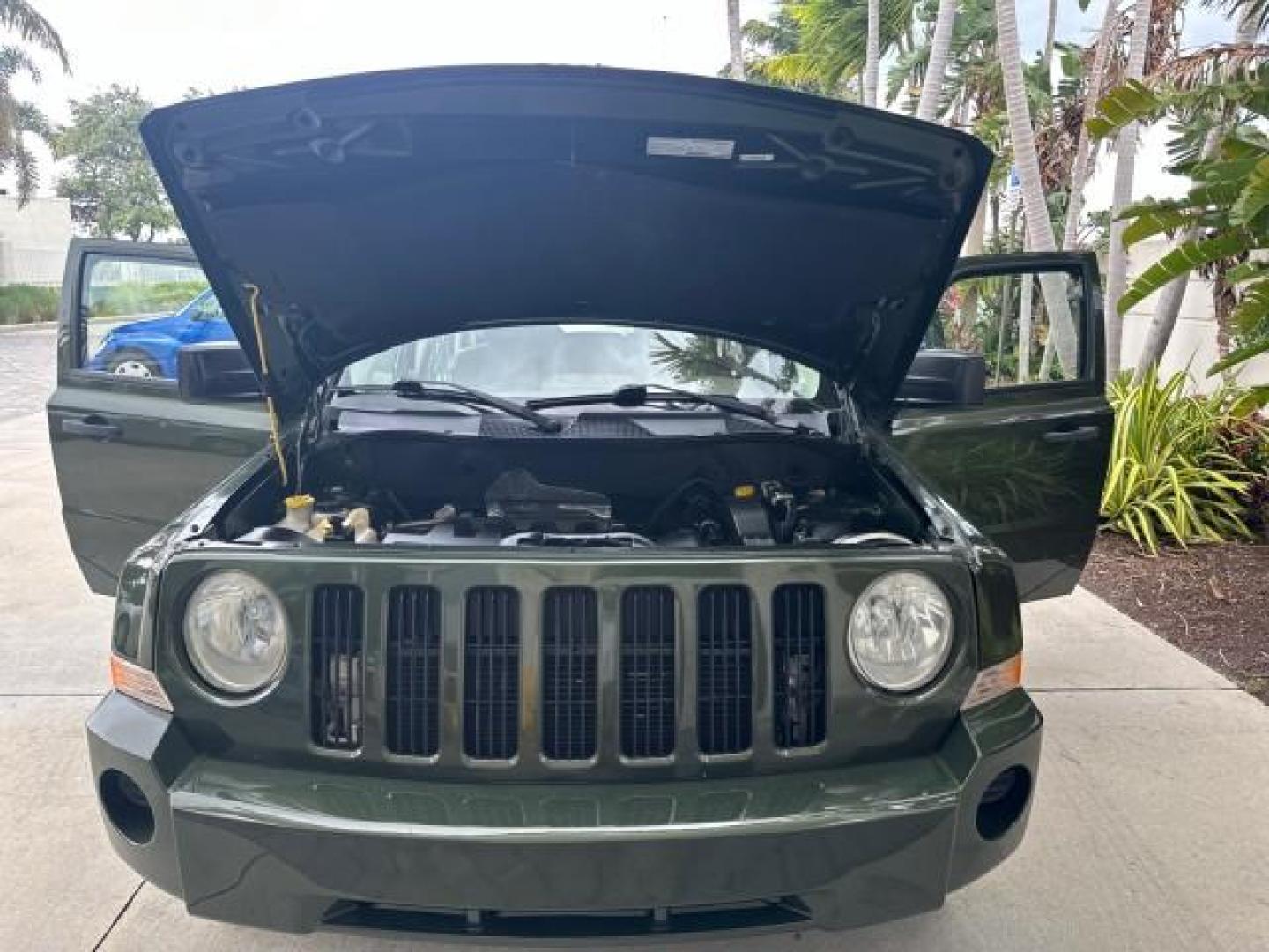 2008 Jeep Green Metallic /Pastel Pebble Beige Jeep Patriot 1 FL Sport LOW MILES 72,642 (1J8FT28W58D) with an 2.4L DOHC 16v I4 Dual VVT Engine engine, Automatic transmission, located at 4701 North Dixie Hwy, Pompano Beach, FL, 33064, (954) 422-2889, 26.240938, -80.123474 - OUR WEBPAGE FLORIDACARS1.COM HAS OVER 100 PHOTOS AND FREE CARFAX LINK 2008 JEEP PATRIOT SPORT ROAD READY 2.4L I4 VIN: 1J8FT28W58D534615 NO RECALLS 4 DOOR WAGON/SPORT UTILITY 1 OWNER FLORIDA 2.4L I4 F DOHC 16V LOW MILES 72,642 GASOLINE 28 SERVICE RECORDS FRONT WHEEL DRIVE NON SMOKERS THIS IS THE ONE - Photo#38