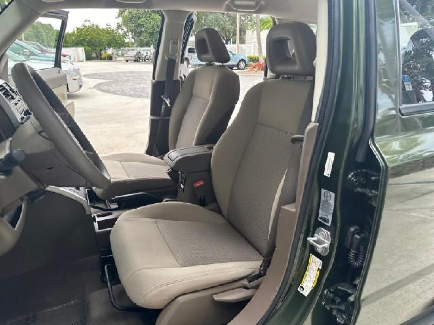 2008 Jeep Green Metallic /Pastel Pebble Beige Jeep Patriot 1 FL Sport LOW MILES 72,642 (1J8FT28W58D) with an 2.4L DOHC 16v I4 Dual VVT Engine engine, Automatic transmission, located at 4701 North Dixie Hwy, Pompano Beach, FL, 33064, (954) 422-2889, 26.240938, -80.123474 - OUR WEBPAGE FLORIDACARS1.COM HAS OVER 100 PHOTOS AND FREE CARFAX LINK 2008 JEEP PATRIOT SPORT ROAD READY 2.4L I4 VIN: 1J8FT28W58D534615 NO RECALLS 4 DOOR WAGON/SPORT UTILITY 1 OWNER FLORIDA 2.4L I4 F DOHC 16V LOW MILES 72,642 GASOLINE 28 SERVICE RECORDS FRONT WHEEL DRIVE NON SMOKERS THIS IS THE ONE - Photo#52