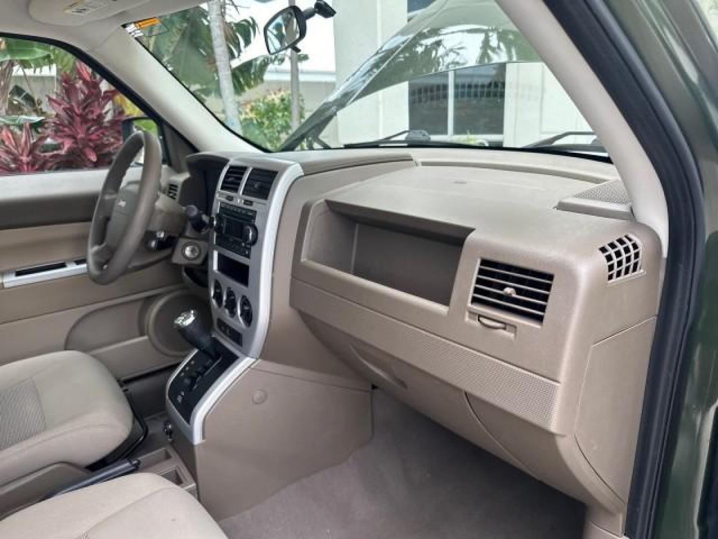 2008 Jeep Green Metallic /Pastel Pebble Beige Jeep Patriot 1 FL Sport LOW MILES 72,642 (1J8FT28W58D) with an 2.4L DOHC 16v I4 Dual VVT Engine engine, Automatic transmission, located at 4701 North Dixie Hwy, Pompano Beach, FL, 33064, (954) 422-2889, 26.240938, -80.123474 - OUR WEBPAGE FLORIDACARS1.COM HAS OVER 100 PHOTOS AND FREE CARFAX LINK 2008 JEEP PATRIOT SPORT ROAD READY 2.4L I4 VIN: 1J8FT28W58D534615 NO RECALLS 4 DOOR WAGON/SPORT UTILITY 1 OWNER FLORIDA 2.4L I4 F DOHC 16V LOW MILES 72,642 GASOLINE 28 SERVICE RECORDS FRONT WHEEL DRIVE NON SMOKERS THIS IS THE ONE - Photo#61