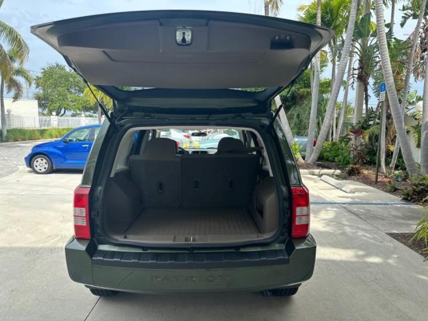 2008 Jeep Green Metallic /Pastel Pebble Beige Jeep Patriot 1 FL Sport LOW MILES 72,642 (1J8FT28W58D) with an 2.4L DOHC 16v I4 Dual VVT Engine engine, Automatic transmission, located at 4701 North Dixie Hwy, Pompano Beach, FL, 33064, (954) 422-2889, 26.240938, -80.123474 - OUR WEBPAGE FLORIDACARS1.COM HAS OVER 100 PHOTOS AND FREE CARFAX LINK 2008 JEEP PATRIOT SPORT ROAD READY 2.4L I4 VIN: 1J8FT28W58D534615 NO RECALLS 4 DOOR WAGON/SPORT UTILITY 1 OWNER FLORIDA 2.4L I4 F DOHC 16V LOW MILES 72,642 GASOLINE 28 SERVICE RECORDS FRONT WHEEL DRIVE NON SMOKERS THIS IS THE ONE - Photo#6