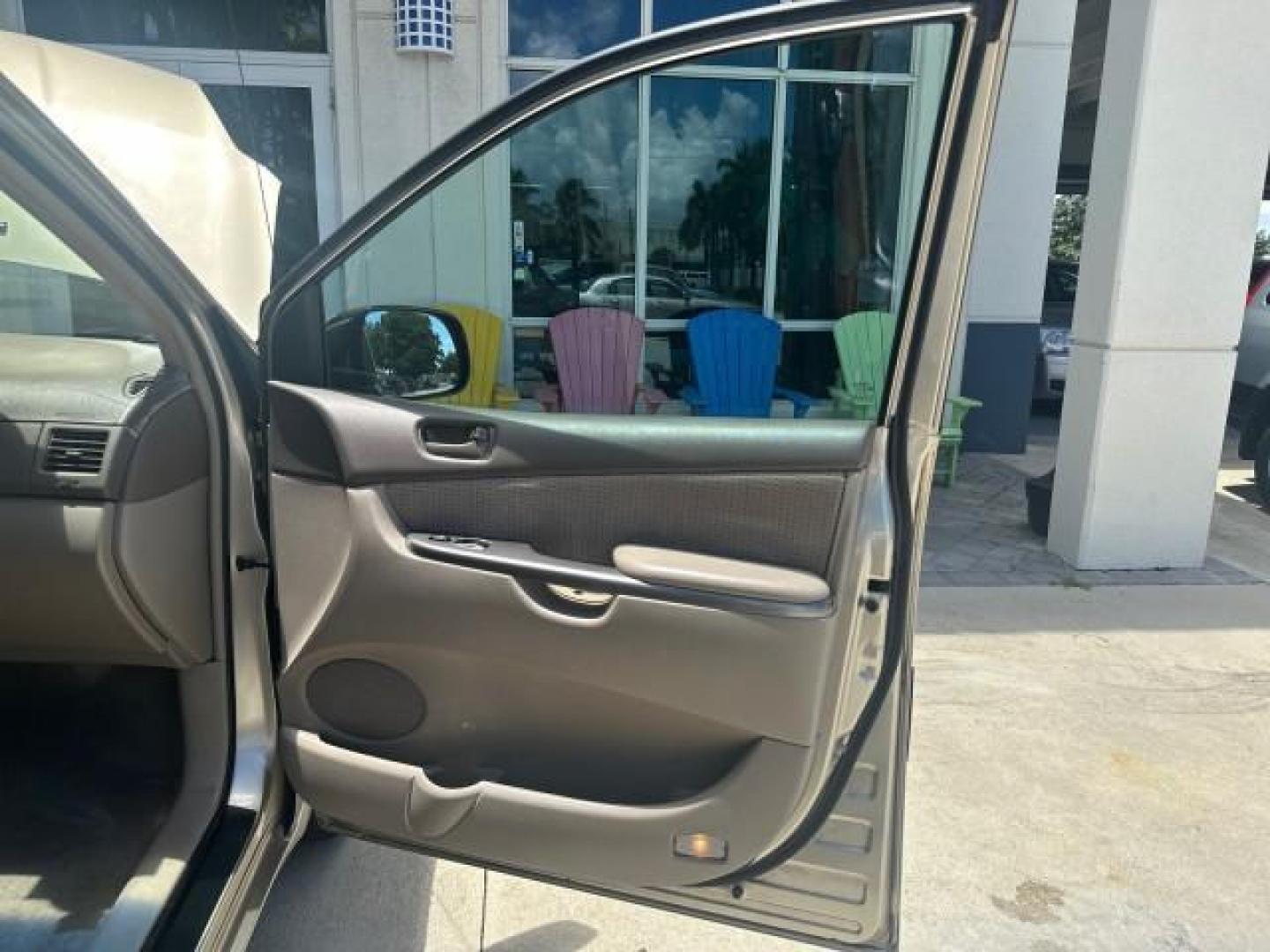2006 Desert Sand Mica /Taupe Toyota Sienna LE VAN 1 FL LOW MILES (5TDZA23C56S) with an 3.3L 24-Valve SEFI DOHC VVT-i V6 Engine engine, Automatic transmission, located at 4701 North Dixie Hwy, Pompano Beach, FL, 33064, (954) 422-2889, 26.240938, -80.123474 - OUR WEBPAGE FLORIDACARS1.COM HAS OVER 100 PHOTOS AND FREE CARFAX LINK 2006 TOYOTA SIENNA CE 7 PASSENGER VIN: 5TDZA23C56S488549 5 T D Z A 2 3 C 5 6 S 4 8 8 5 4 9 VAN 3.3L V6 F DOHC 24V GASOLINE FRONT WHEEL DRIVE Top Features Alloy Wheels Quad Seats Fold-Away Third Row Rear Air Conditioning Front Seat - Photo#58