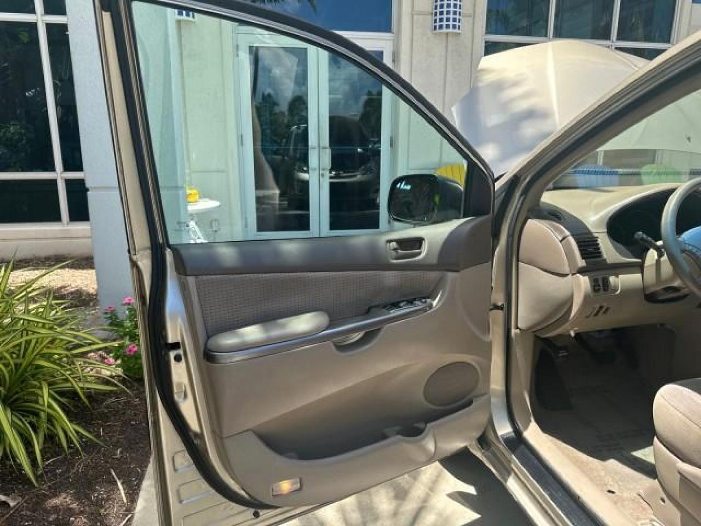 2006 Desert Sand Mica /Taupe Toyota Sienna LE VAN 1 FL LOW MILES (5TDZA23C56S) with an 3.3L 24-Valve SEFI DOHC VVT-i V6 Engine engine, Automatic transmission, located at 4701 North Dixie Hwy, Pompano Beach, FL, 33064, (954) 422-2889, 26.240938, -80.123474 - OUR WEBPAGE FLORIDACARS1.COM HAS OVER 100 PHOTOS AND FREE CARFAX LINK 2006 TOYOTA SIENNA CE 7 PASSENGER VIN: 5TDZA23C56S488549 5 T D Z A 2 3 C 5 6 S 4 8 8 5 4 9 VAN 3.3L V6 F DOHC 24V GASOLINE FRONT WHEEL DRIVE Top Features Alloy Wheels Quad Seats Fold-Away Third Row Rear Air Conditioning Front Seat - Photo#60