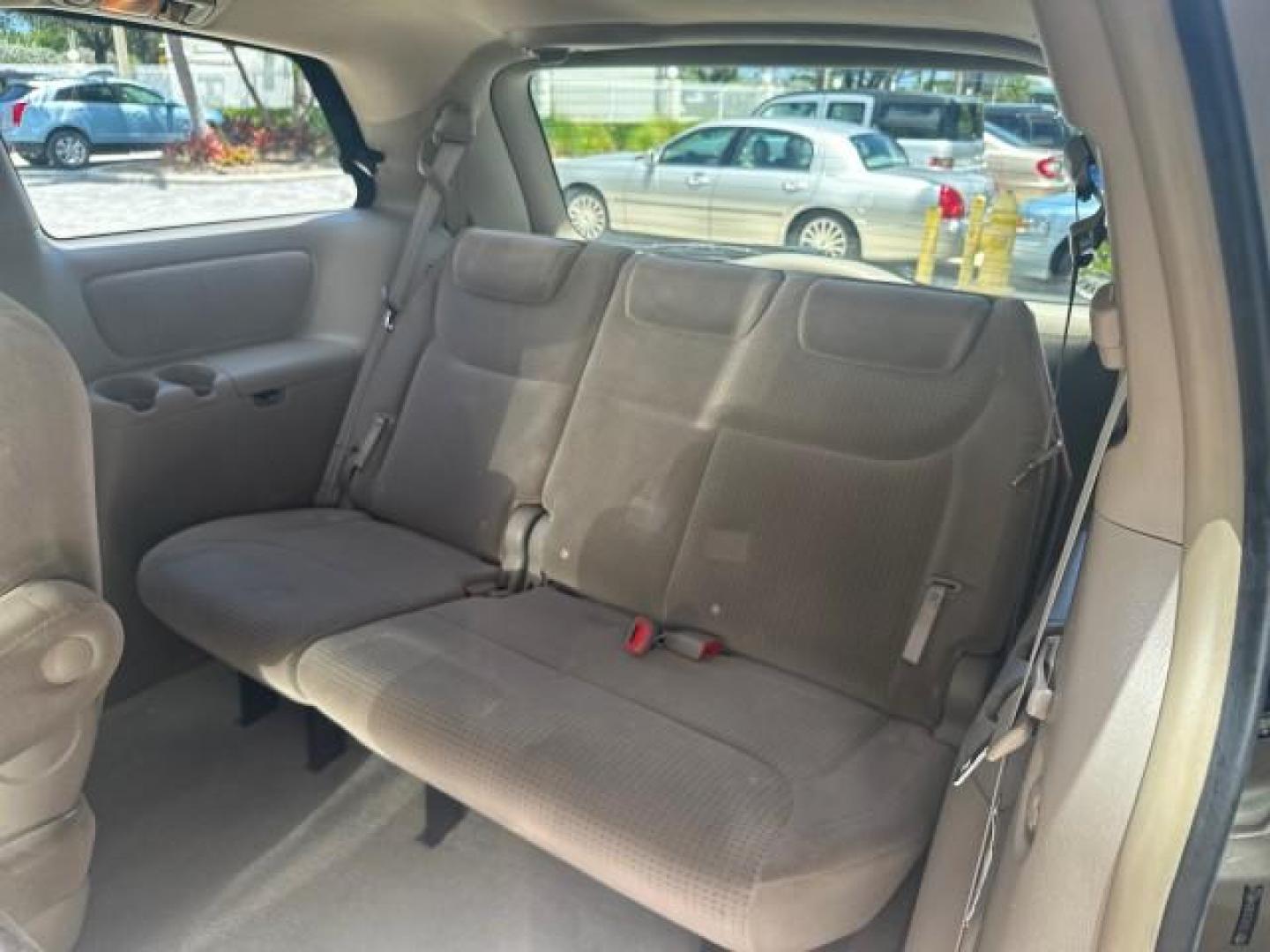 2006 Desert Sand Mica /Taupe Toyota Sienna LE VAN 1 FL LOW MILES (5TDZA23C56S) with an 3.3L 24-Valve SEFI DOHC VVT-i V6 Engine engine, Automatic transmission, located at 4701 North Dixie Hwy, Pompano Beach, FL, 33064, (954) 422-2889, 26.240938, -80.123474 - OUR WEBPAGE FLORIDACARS1.COM HAS OVER 100 PHOTOS AND FREE CARFAX LINK 2006 TOYOTA SIENNA CE 7 PASSENGER VIN: 5TDZA23C56S488549 5 T D Z A 2 3 C 5 6 S 4 8 8 5 4 9 VAN 3.3L V6 F DOHC 24V GASOLINE FRONT WHEEL DRIVE Top Features Alloy Wheels Quad Seats Fold-Away Third Row Rear Air Conditioning Front Seat - Photo#69