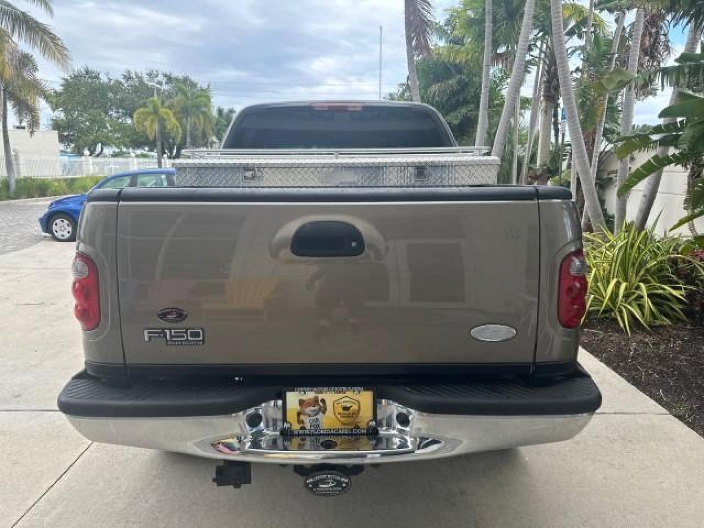 2002 Arizona Beige Metallic /Medium Parchment Ford F-150 XLT 4WD LOW MILES 73216 (1FTRW08L82K) with an 5.4L SEFI OHC V8 Triton Engine engine, Automatic transmission, located at 4701 North Dixie Hwy, Pompano Beach, FL, 33064, (954) 422-2889, 26.240938, -80.123474 - OUR WEBPAGE FLORIDACARS1.COM HAS OVER 100 PHOTOS AND FREE CARFAX LINK 2002 FORD F-150 XLT CREW CAB $ 33,320 NEW NO RECALLS VIN: 1FTRW08L82KD62296 1 F T R W 0 8 L 8 2 K D 6 2 2 9 6 CREW PICKUP 5.4L V8 F SOHC 16V GASOLINE REAR WHEEL DRIVE W/ 4X4 Top Features 4WD/AWD Running Boards Alloy Wheels Tow Hit - Photo#2