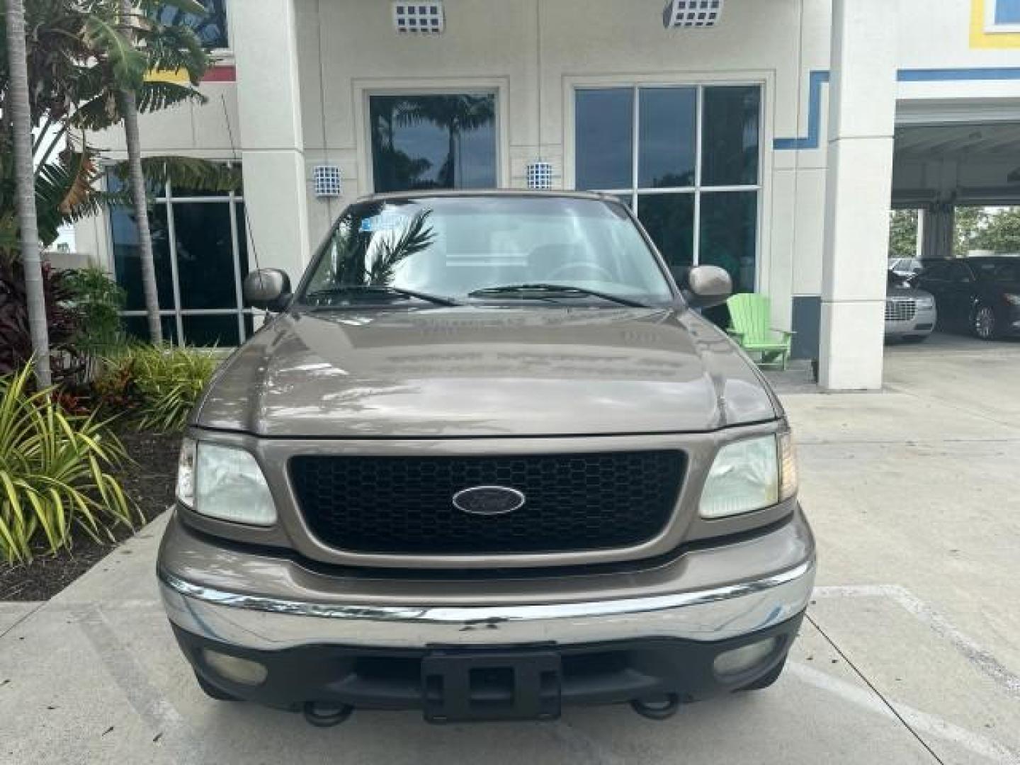 2002 Arizona Beige Metallic /Medium Parchment Ford F-150 XLT 4WD LOW MILES 73216 (1FTRW08L82K) with an 5.4L SEFI OHC V8 Triton Engine engine, Automatic transmission, located at 4701 North Dixie Hwy, Pompano Beach, FL, 33064, (954) 422-2889, 26.240938, -80.123474 - OUR WEBPAGE FLORIDACARS1.COM HAS OVER 100 PHOTOS AND FREE CARFAX LINK 2002 FORD F-150 XLT CREW CAB $ 33,320 NEW NO RECALLS VIN: 1FTRW08L82KD62296 1 F T R W 0 8 L 8 2 K D 6 2 2 9 6 CREW PICKUP 5.4L V8 F SOHC 16V GASOLINE REAR WHEEL DRIVE W/ 4X4 Top Features 4WD/AWD Running Boards Alloy Wheels Tow Hit - Photo#3