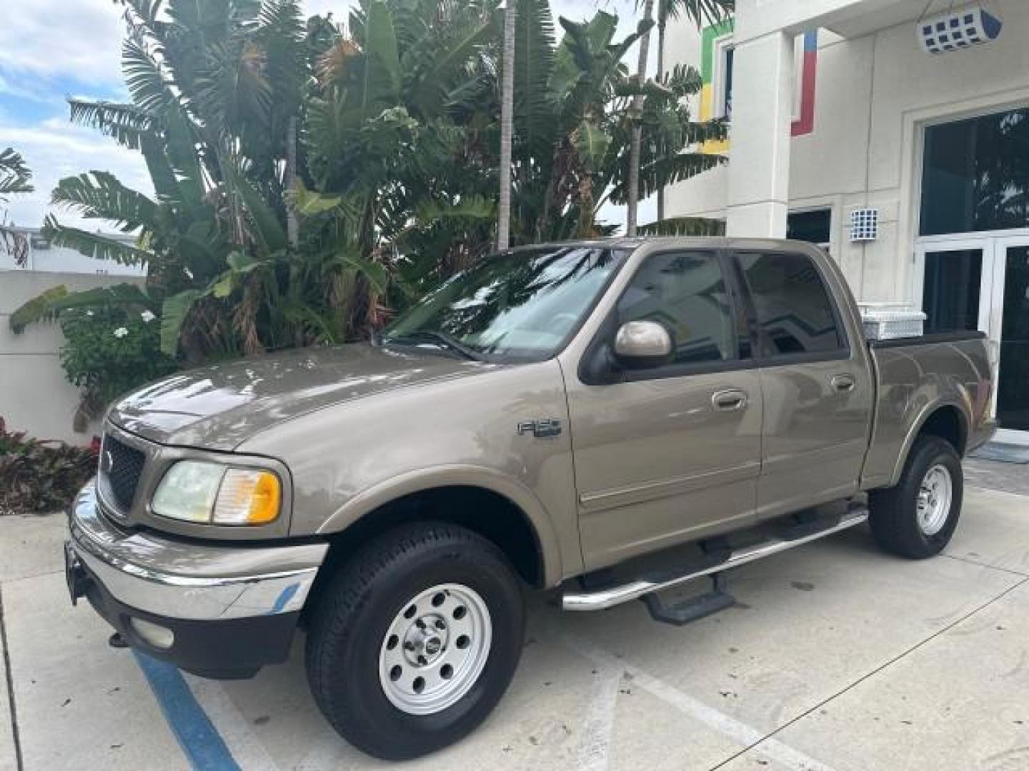 2002 Arizona Beige Metallic /Medium Parchment Ford F-150 XLT 4WD LOW MILES 73216 (1FTRW08L82K) with an 5.4L SEFI OHC V8 Triton Engine engine, Automatic transmission, located at 4701 North Dixie Hwy, Pompano Beach, FL, 33064, (954) 422-2889, 26.240938, -80.123474 - OUR WEBPAGE FLORIDACARS1.COM HAS OVER 100 PHOTOS AND FREE CARFAX LINK 2002 FORD F-150 XLT CREW CAB $ 33,320 NEW NO RECALLS VIN: 1FTRW08L82KD62296 1 F T R W 0 8 L 8 2 K D 6 2 2 9 6 CREW PICKUP 5.4L V8 F SOHC 16V GASOLINE REAR WHEEL DRIVE W/ 4X4 Top Features 4WD/AWD Running Boards Alloy Wheels Tow Hit - Photo#39