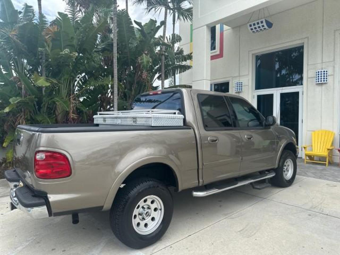 2002 Arizona Beige Metallic /Medium Parchment Ford F-150 XLT 4WD LOW MILES 73216 (1FTRW08L82K) with an 5.4L SEFI OHC V8 Triton Engine engine, Automatic transmission, located at 4701 North Dixie Hwy, Pompano Beach, FL, 33064, (954) 422-2889, 26.240938, -80.123474 - OUR WEBPAGE FLORIDACARS1.COM HAS OVER 100 PHOTOS AND FREE CARFAX LINK 2002 FORD F-150 XLT CREW CAB $ 33,320 NEW NO RECALLS VIN: 1FTRW08L82KD62296 1 F T R W 0 8 L 8 2 K D 6 2 2 9 6 CREW PICKUP 5.4L V8 F SOHC 16V GASOLINE REAR WHEEL DRIVE W/ 4X4 Top Features 4WD/AWD Running Boards Alloy Wheels Tow Hit - Photo#4