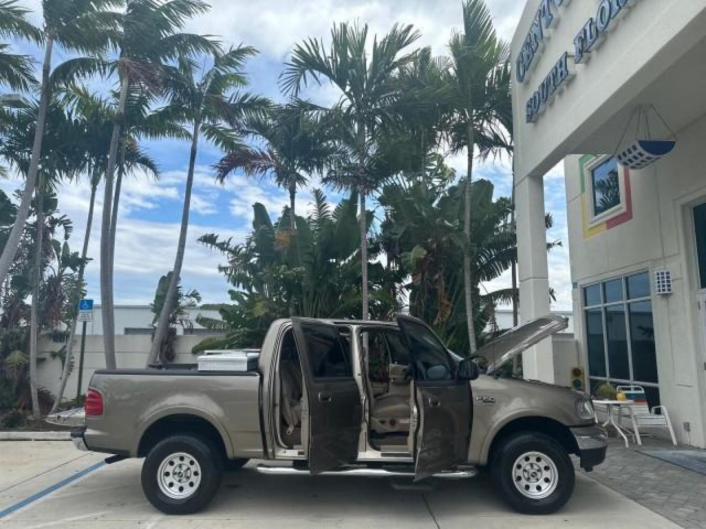 2002 Arizona Beige Metallic /Medium Parchment Ford F-150 XLT 4WD LOW MILES 73216 (1FTRW08L82K) with an 5.4L SEFI OHC V8 Triton Engine engine, Automatic transmission, located at 4701 North Dixie Hwy, Pompano Beach, FL, 33064, (954) 422-2889, 26.240938, -80.123474 - OUR WEBPAGE FLORIDACARS1.COM HAS OVER 100 PHOTOS AND FREE CARFAX LINK 2002 FORD F-150 XLT CREW CAB $ 33,320 NEW NO RECALLS VIN: 1FTRW08L82KD62296 1 F T R W 0 8 L 8 2 K D 6 2 2 9 6 CREW PICKUP 5.4L V8 F SOHC 16V GASOLINE REAR WHEEL DRIVE W/ 4X4 Top Features 4WD/AWD Running Boards Alloy Wheels Tow Hit - Photo#6