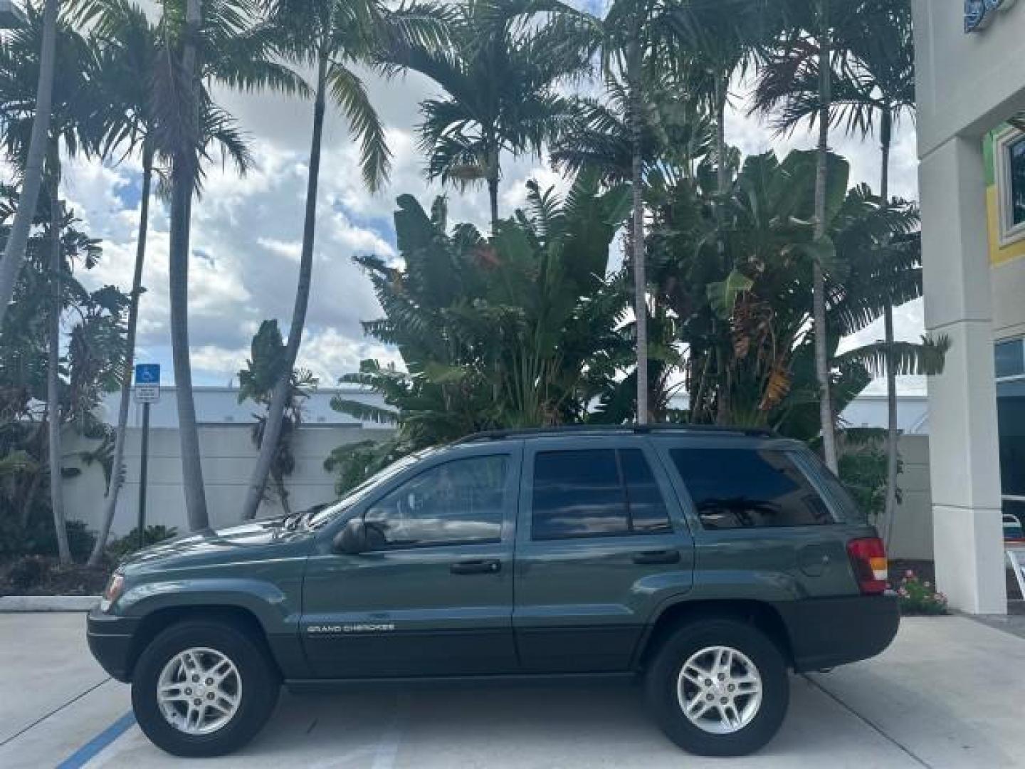 2002 Onyx Green Pearl /Sandstone Jeep Grand Cherokee 4w4 Laredo LOW MILES 87,762 (1J4GW48S42C) with an 4.0L SMFI I6 Power Tech Engine engine, Automatic transmission, located at 4701 North Dixie Hwy, Pompano Beach, FL, 33064, (954) 422-2889, 26.240938, -80.123474 - OUR WEBPAGE FLORIDACARS1.COM HAS OVER 100 PHOTOS AND FREE CARFAX LINK 2002 JEEP GRAND CHEROKEE LAREDO ROAD READY 4.0L V6 VIN: 1J4GW48S42C308150 NO ACCIDENTS 4 DOOR WAGON/SPORT UTILITY NO RECALLS 4X4 4.0L I6 F TOW PKG LOW MILES 87,762 GASOLINE POWER SEATS/MIRRORS REAR WHEEL DRIVE W/ 4X4 30 SERVICE RE - Photo#38