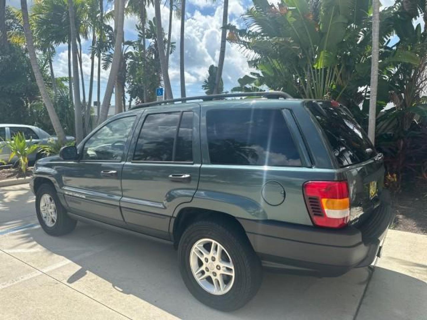 2002 Onyx Green Pearl /Sandstone Jeep Grand Cherokee 4w4 Laredo LOW MILES 87,762 (1J4GW48S42C) with an 4.0L SMFI I6 Power Tech Engine engine, Automatic transmission, located at 4701 North Dixie Hwy, Pompano Beach, FL, 33064, (954) 422-2889, 26.240938, -80.123474 - OUR WEBPAGE FLORIDACARS1.COM HAS OVER 100 PHOTOS AND FREE CARFAX LINK 2002 JEEP GRAND CHEROKEE LAREDO ROAD READY 4.0L V6 VIN: 1J4GW48S42C308150 NO ACCIDENTS 4 DOOR WAGON/SPORT UTILITY NO RECALLS 4X4 4.0L I6 F TOW PKG LOW MILES 87,762 GASOLINE POWER SEATS/MIRRORS REAR WHEEL DRIVE W/ 4X4 30 SERVICE RE - Photo#40