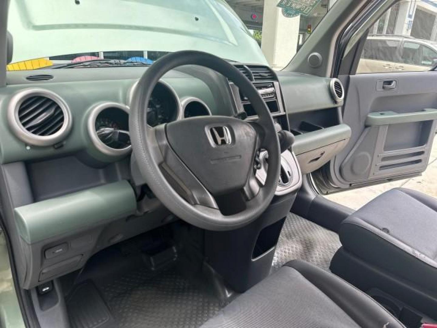 2005 Galapogos Green Metallic /Gray/Green Honda Element LX 1 FL 18 SERVICES (5J6YH18315L) with an 2.4L DOHC MPFI 16-Valve i-VTEC I4 Engine engine, Automatic transmission, located at 4701 North Dixie Hwy, Pompano Beach, FL, 33064, (954) 422-2889, 26.240938, -80.123474 - OUR WEBPAGE FLORIDACARS1.COM HAS OVER 100 PHOTOS AND FREE CARFAX LINK 2005 HONDA ELEMENT LX VIN: 5J6YH18315L000038 5 J 6 Y H 1 8 3 1 5 L 0 0 0 0 3 8 4 DOOR WAGON/SPORT UTILITY 2.4L I4 F DOHC 16V GASOLINE FRONT WHEEL DRIVE THIS IS ONE OF THE NICEST HONDA S WE HAVE EVER LISTED RETIREE 1 OWNER FLORIDA - Photo#15