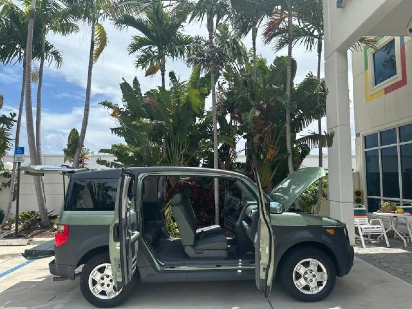 2005 Galapogos Green Metallic /Gray/Green Honda Element LX 1 FL 18 SERVICES (5J6YH18315L) with an 2.4L DOHC MPFI 16-Valve i-VTEC I4 Engine engine, Automatic transmission, located at 4701 North Dixie Hwy, Pompano Beach, FL, 33064, (954) 422-2889, 26.240938, -80.123474 - OUR WEBPAGE FLORIDACARS1.COM HAS OVER 100 PHOTOS AND FREE CARFAX LINK 2005 HONDA ELEMENT LX VIN: 5J6YH18315L000038 5 J 6 Y H 1 8 3 1 5 L 0 0 0 0 3 8 4 DOOR WAGON/SPORT UTILITY 2.4L I4 F DOHC 16V GASOLINE FRONT WHEEL DRIVE THIS IS ONE OF THE NICEST HONDA S WE HAVE EVER LISTED RETIREE 1 OWNER FLORIDA - Photo#47