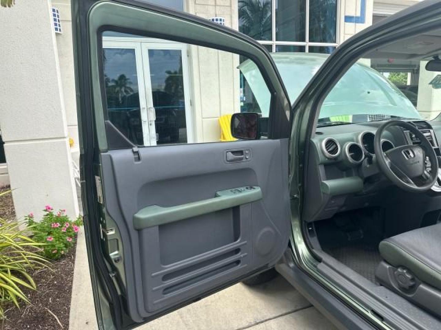 2005 Galapogos Green Metallic /Gray/Green Honda Element LX 1 FL 18 SERVICES (5J6YH18315L) with an 2.4L DOHC MPFI 16-Valve i-VTEC I4 Engine engine, Automatic transmission, located at 4701 North Dixie Hwy, Pompano Beach, FL, 33064, (954) 422-2889, 26.240938, -80.123474 - OUR WEBPAGE FLORIDACARS1.COM HAS OVER 100 PHOTOS AND FREE CARFAX LINK 2005 HONDA ELEMENT LX VIN: 5J6YH18315L000038 5 J 6 Y H 1 8 3 1 5 L 0 0 0 0 3 8 4 DOOR WAGON/SPORT UTILITY 2.4L I4 F DOHC 16V GASOLINE FRONT WHEEL DRIVE THIS IS ONE OF THE NICEST HONDA S WE HAVE EVER LISTED RETIREE 1 OWNER FLORIDA - Photo#56