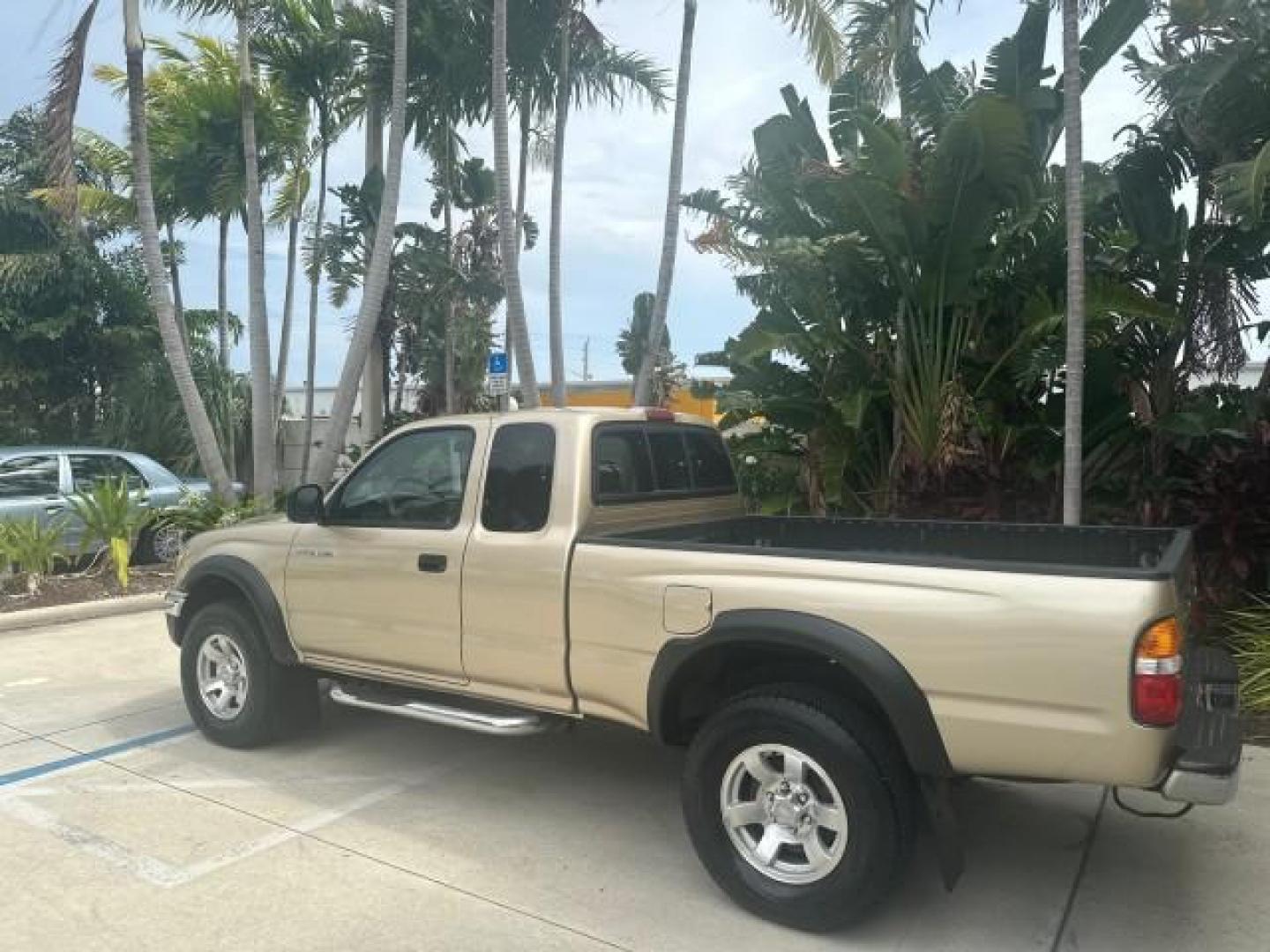 2003 Mystic Gold Metallic /Oak Toyota Tacoma PreRunner FL LOW MILES 46.375 (5TESN92NX3Z) with an 3.4L DOHC EFI 24-Valve V6 Engine engine, Automatic transmission, located at 4701 North Dixie Hwy, Pompano Beach, FL, 33064, (954) 422-2889, 26.240938, -80.123474 - OUR WEBPAGE FLORIDACARS1.COM HAS OVER 100 PHOTOS AND FREE CARFAX LINK 2003 TOYOTA TACOMA PRERUNNER V6 HARD TO FIND THIS ONE IS THE ONE VIN: 5TESN92NX3Z184813 5 T E S N 9 2 N X 3 Z 1 8 4 8 1 3 CLUB CAB PICKUP 3.4L V6 F DOHC 24V GASOLINE REAR WHEEL DRIVE NO RECALLS CARFAX 19 SERVICE RECORDS NO ACCIDEN - Photo#1