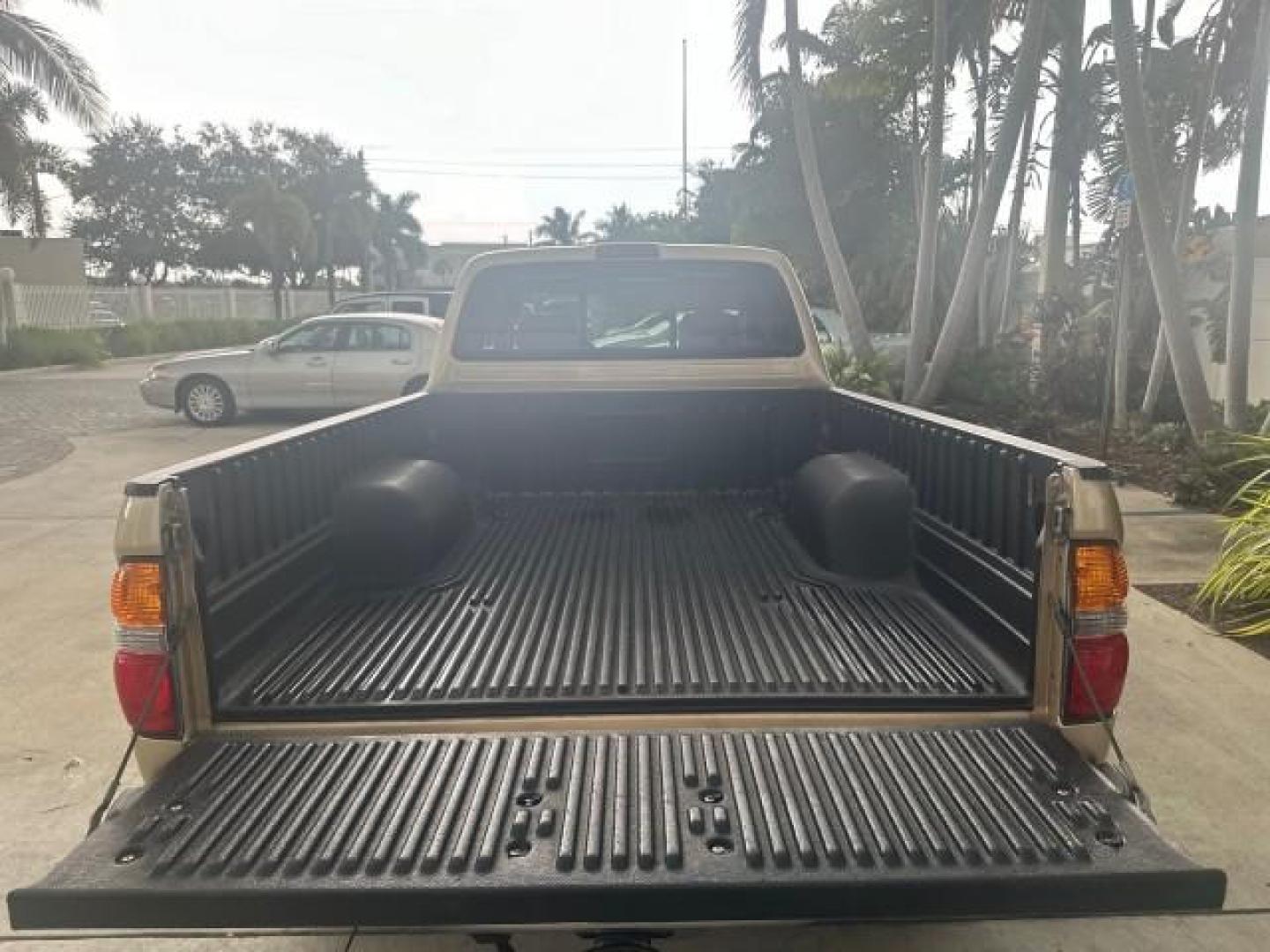 2003 Mystic Gold Metallic /Oak Toyota Tacoma PreRunner FL LOW MILES 46.375 (5TESN92NX3Z) with an 3.4L DOHC EFI 24-Valve V6 Engine engine, Automatic transmission, located at 4701 North Dixie Hwy, Pompano Beach, FL, 33064, (954) 422-2889, 26.240938, -80.123474 - OUR WEBPAGE FLORIDACARS1.COM HAS OVER 100 PHOTOS AND FREE CARFAX LINK 2003 TOYOTA TACOMA PRERUNNER V6 HARD TO FIND THIS ONE IS THE ONE VIN: 5TESN92NX3Z184813 5 T E S N 9 2 N X 3 Z 1 8 4 8 1 3 CLUB CAB PICKUP 3.4L V6 F DOHC 24V GASOLINE REAR WHEEL DRIVE NO RECALLS CARFAX 19 SERVICE RECORDS NO ACCIDEN - Photo#42