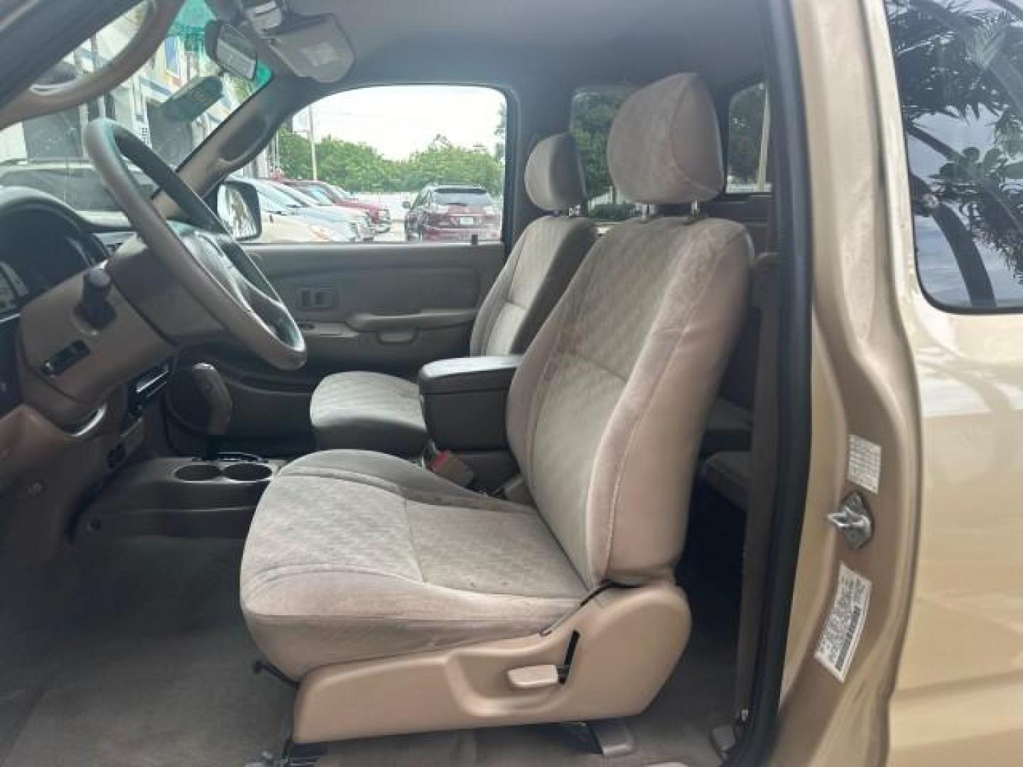 2003 Mystic Gold Metallic /Oak Toyota Tacoma PreRunner FL LOW MILES 46.375 (5TESN92NX3Z) with an 3.4L DOHC EFI 24-Valve V6 Engine engine, Automatic transmission, located at 4701 North Dixie Hwy, Pompano Beach, FL, 33064, (954) 422-2889, 26.240938, -80.123474 - OUR WEBPAGE FLORIDACARS1.COM HAS OVER 100 PHOTOS AND FREE CARFAX LINK 2003 TOYOTA TACOMA PRERUNNER V6 HARD TO FIND THIS ONE IS THE ONE VIN: 5TESN92NX3Z184813 5 T E S N 9 2 N X 3 Z 1 8 4 8 1 3 CLUB CAB PICKUP 3.4L V6 F DOHC 24V GASOLINE REAR WHEEL DRIVE NO RECALLS CARFAX 19 SERVICE RECORDS NO ACCIDEN - Photo#69