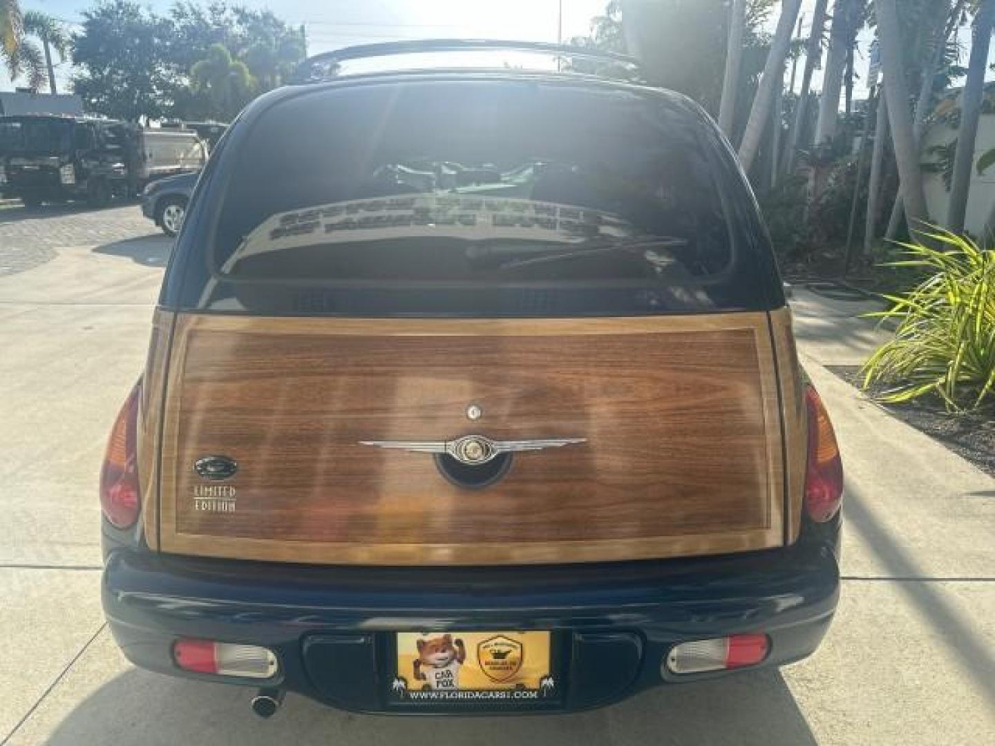 2003 Electric Blue Pearl /Taupe/Pearl Beige Chrysler PT Cruiser Limited WOODY LOW MILES 41,863 (3C8FY68B13T) with an 2.4L DOHC SMPI 16-Valve I4 Engine engine, Automatic transmission, located at 4701 North Dixie Hwy, Pompano Beach, FL, 33064, (954) 422-2889, 26.240938, -80.123474 - OUR WEBPAGE FLORIDACARS1.COM HAS OVER 100 PHOTOS AND FREE CARFAX LINK 2003 CHRYSLER PT CRUISER LIMITED EDITION WOODY EDITION VIN: 3C8FY68B13T591246 3 C 8 F Y 6 8 B 1 3 T 5 9 1 2 4 6 2.4L I4 F DOHC 16V GASOLINE 29 MPG FRONT WHEEL DRIVE NO RECALLS Top Features Alloy Wheels Leather and Suede Seats Su - Photo#3