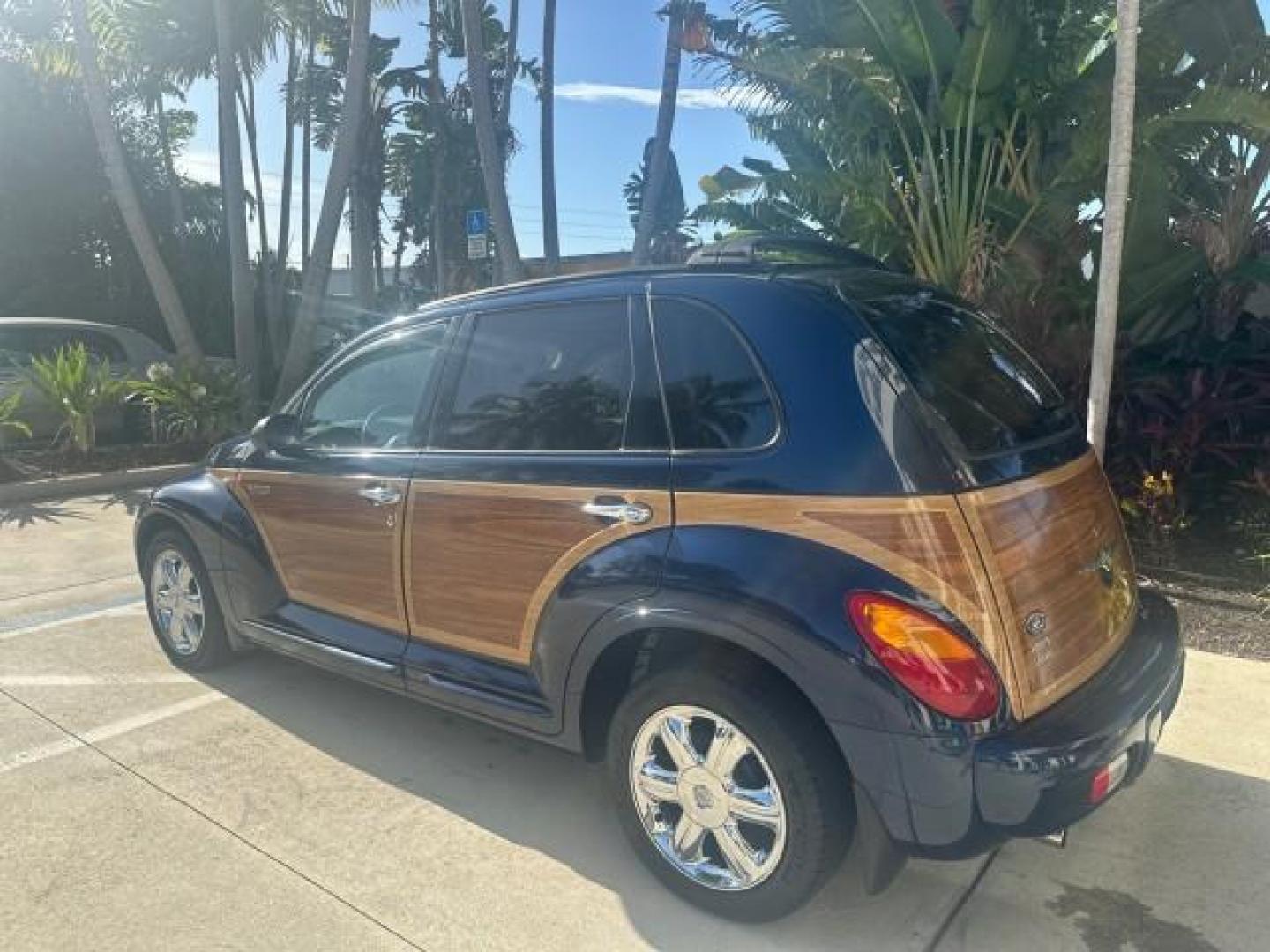 2003 Electric Blue Pearl /Taupe/Pearl Beige Chrysler PT Cruiser Limited WOODY LOW MILES 41,863 (3C8FY68B13T) with an 2.4L DOHC SMPI 16-Valve I4 Engine engine, Automatic transmission, located at 4701 North Dixie Hwy, Pompano Beach, FL, 33064, (954) 422-2889, 26.240938, -80.123474 - OUR WEBPAGE FLORIDACARS1.COM HAS OVER 100 PHOTOS AND FREE CARFAX LINK 2003 CHRYSLER PT CRUISER LIMITED EDITION WOODY EDITION VIN: 3C8FY68B13T591246 3 C 8 F Y 6 8 B 1 3 T 5 9 1 2 4 6 2.4L I4 F DOHC 16V GASOLINE 29 MPG FRONT WHEEL DRIVE NO RECALLS Top Features Alloy Wheels Leather and Suede Seats Su - Photo#39