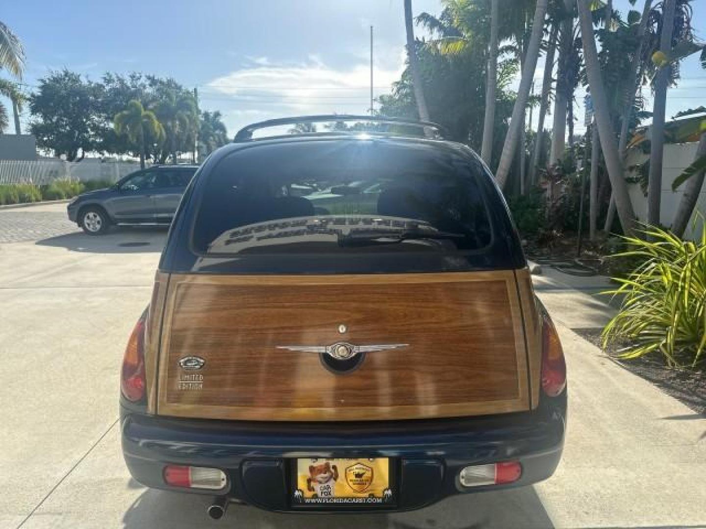 2003 Electric Blue Pearl /Taupe/Pearl Beige Chrysler PT Cruiser Limited WOODY LOW MILES 41,863 (3C8FY68B13T) with an 2.4L DOHC SMPI 16-Valve I4 Engine engine, Automatic transmission, located at 4701 North Dixie Hwy, Pompano Beach, FL, 33064, (954) 422-2889, 26.240938, -80.123474 - OUR WEBPAGE FLORIDACARS1.COM HAS OVER 100 PHOTOS AND FREE CARFAX LINK 2003 CHRYSLER PT CRUISER LIMITED EDITION WOODY EDITION VIN: 3C8FY68B13T591246 3 C 8 F Y 6 8 B 1 3 T 5 9 1 2 4 6 2.4L I4 F DOHC 16V GASOLINE 29 MPG FRONT WHEEL DRIVE NO RECALLS Top Features Alloy Wheels Leather and Suede Seats Su - Photo#40