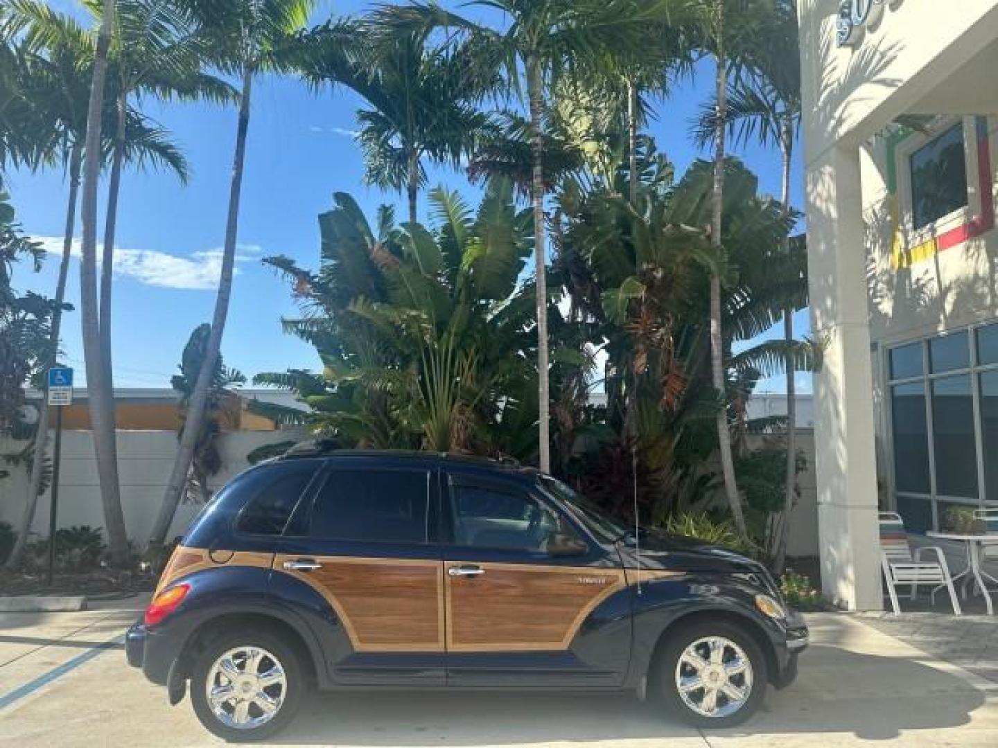 2003 Electric Blue Pearl /Taupe/Pearl Beige Chrysler PT Cruiser Limited WOODY LOW MILES 41,863 (3C8FY68B13T) with an 2.4L DOHC SMPI 16-Valve I4 Engine engine, Automatic transmission, located at 4701 North Dixie Hwy, Pompano Beach, FL, 33064, (954) 422-2889, 26.240938, -80.123474 - OUR WEBPAGE FLORIDACARS1.COM HAS OVER 100 PHOTOS AND FREE CARFAX LINK 2003 CHRYSLER PT CRUISER LIMITED EDITION WOODY EDITION VIN: 3C8FY68B13T591246 3 C 8 F Y 6 8 B 1 3 T 5 9 1 2 4 6 2.4L I4 F DOHC 16V GASOLINE 29 MPG FRONT WHEEL DRIVE NO RECALLS Top Features Alloy Wheels Leather and Suede Seats Su - Photo#45