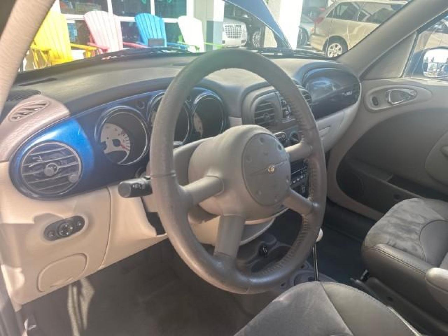 2003 Electric Blue Pearl /Taupe/Pearl Beige Chrysler PT Cruiser Limited WOODY LOW MILES 41,863 (3C8FY68B13T) with an 2.4L DOHC SMPI 16-Valve I4 Engine engine, Automatic transmission, located at 4701 North Dixie Hwy, Pompano Beach, FL, 33064, (954) 422-2889, 26.240938, -80.123474 - OUR WEBPAGE FLORIDACARS1.COM HAS OVER 100 PHOTOS AND FREE CARFAX LINK 2003 CHRYSLER PT CRUISER LIMITED EDITION WOODY EDITION VIN: 3C8FY68B13T591246 3 C 8 F Y 6 8 B 1 3 T 5 9 1 2 4 6 2.4L I4 F DOHC 16V GASOLINE 29 MPG FRONT WHEEL DRIVE NO RECALLS Top Features Alloy Wheels Leather and Suede Seats Su - Photo#81